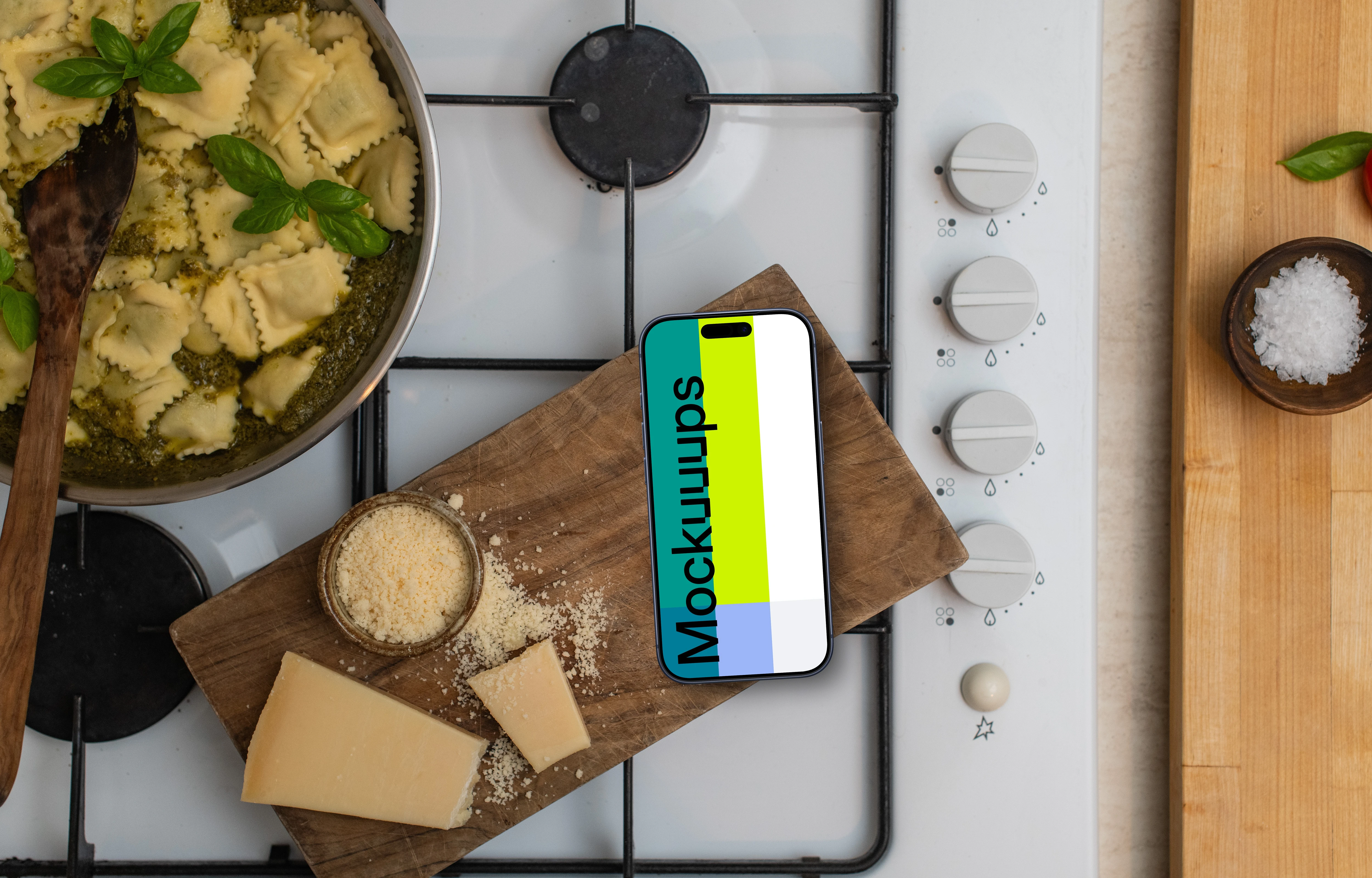 iPhone on wooden cutting board with cheese