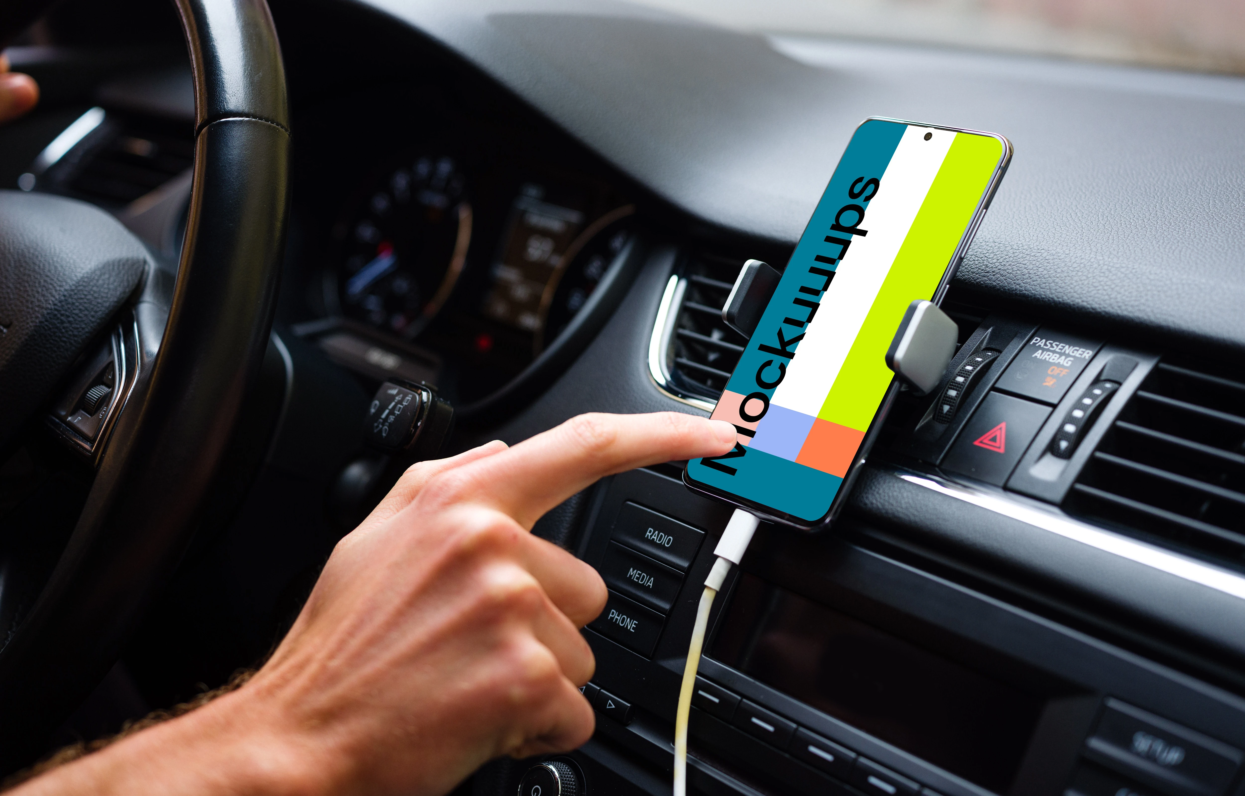 Driver tapping Samsung S20 mockup mounted on car dashboard