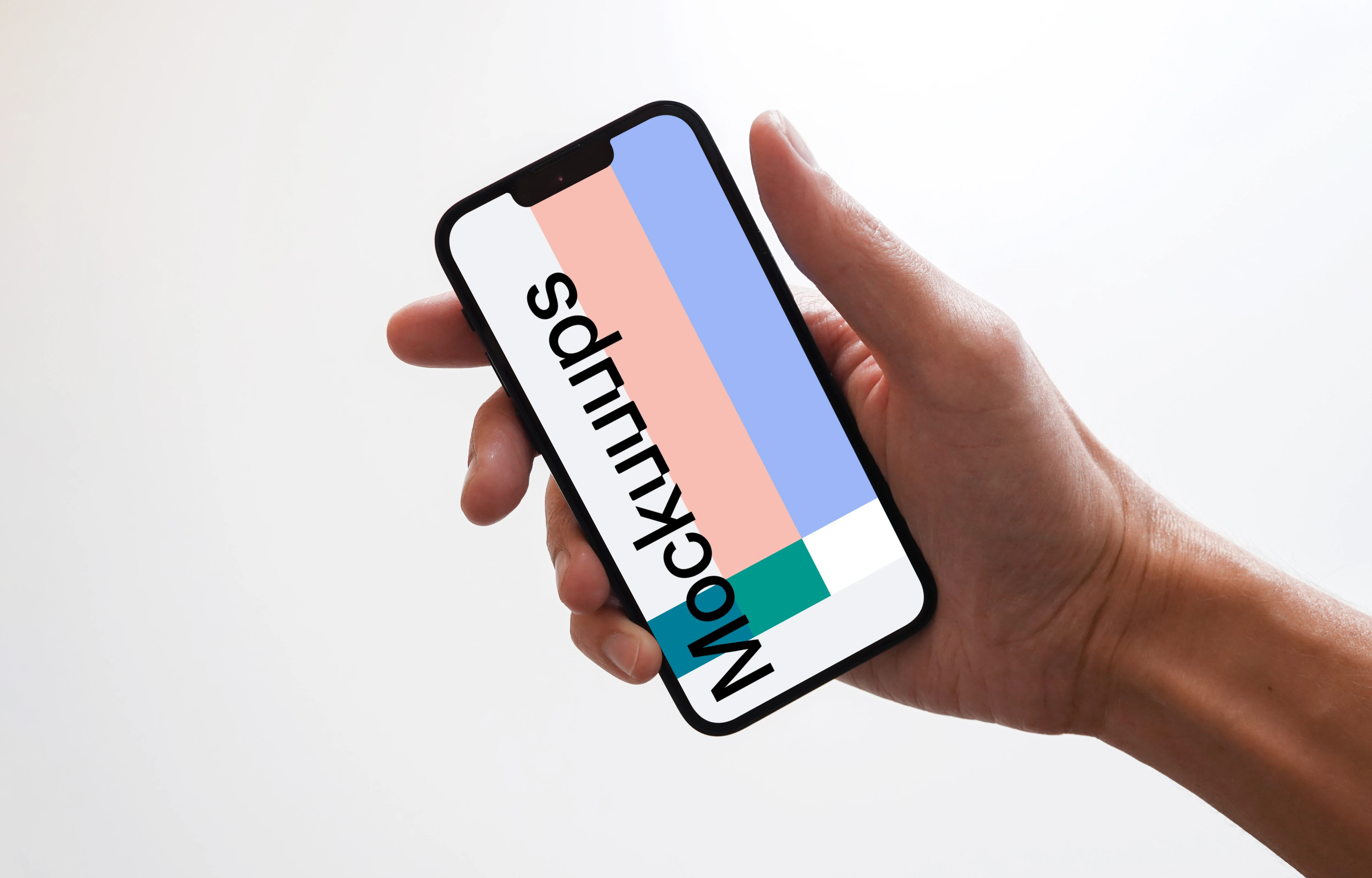 iPhone 13 mockup held by user against plain white surface