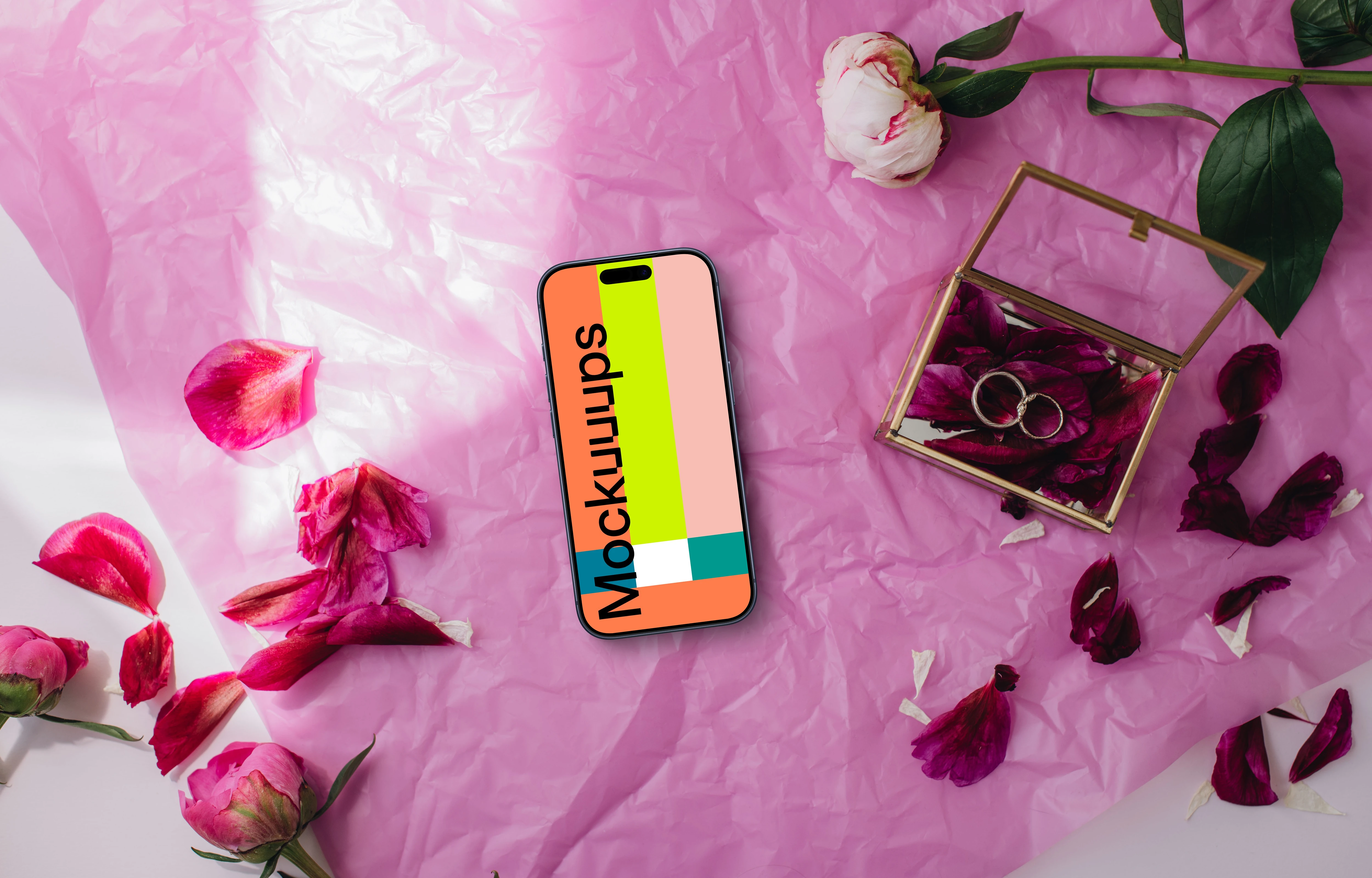 Wedding themed iPhone mockup with pink background and rose petals