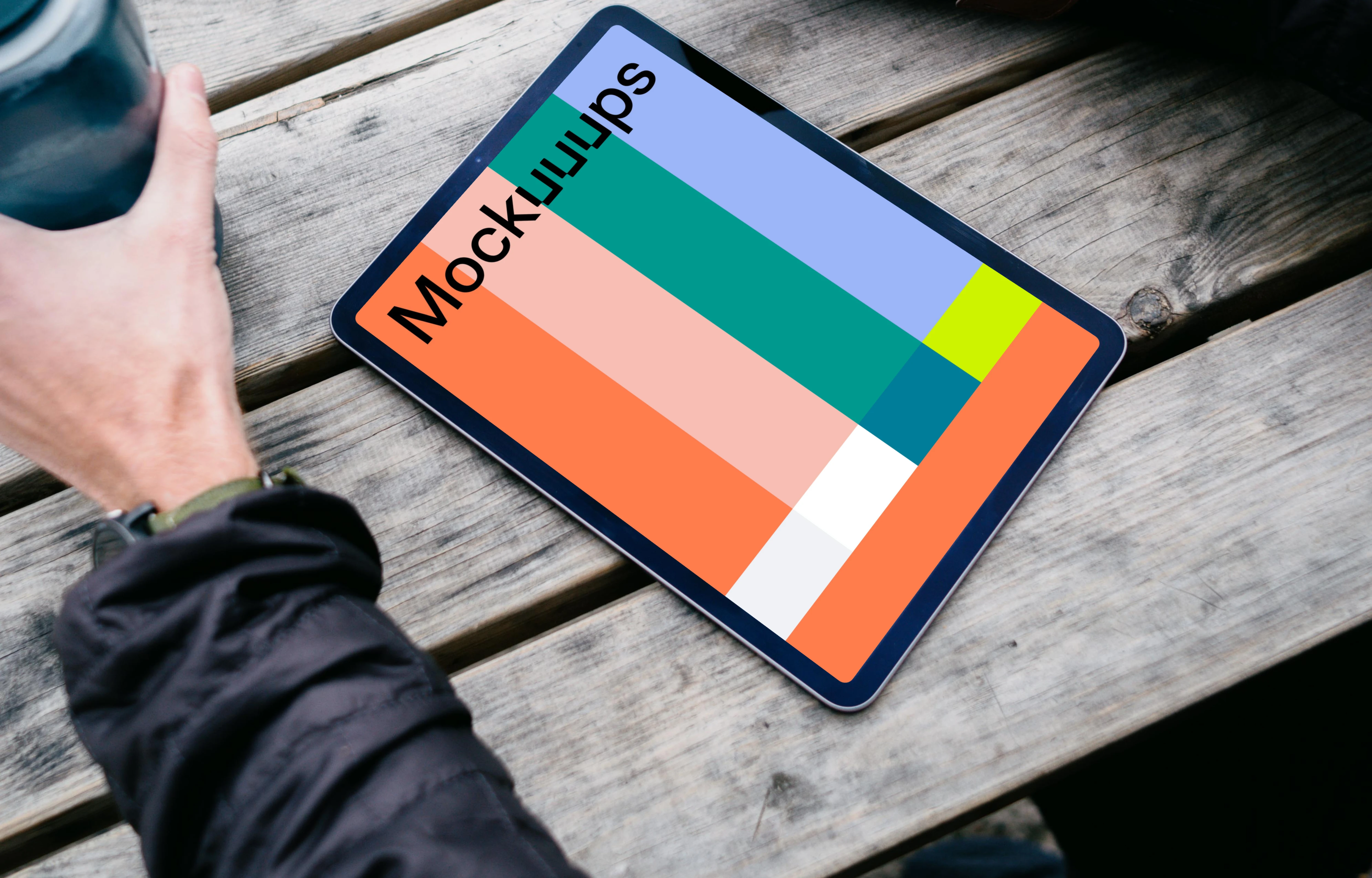 iPad Air mockup help by a use outdoors 
