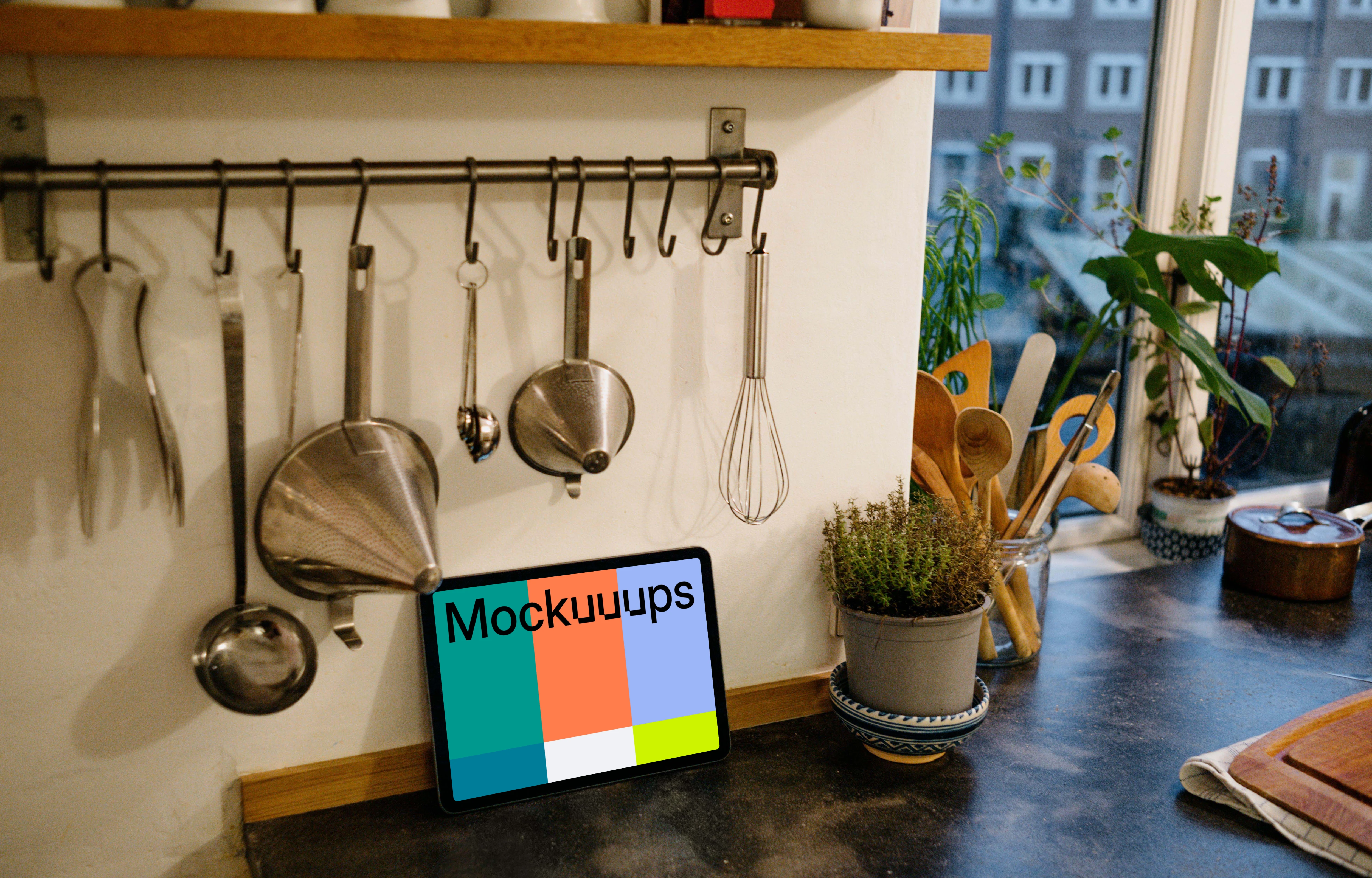iPad Air mockup placed under a utensil rack