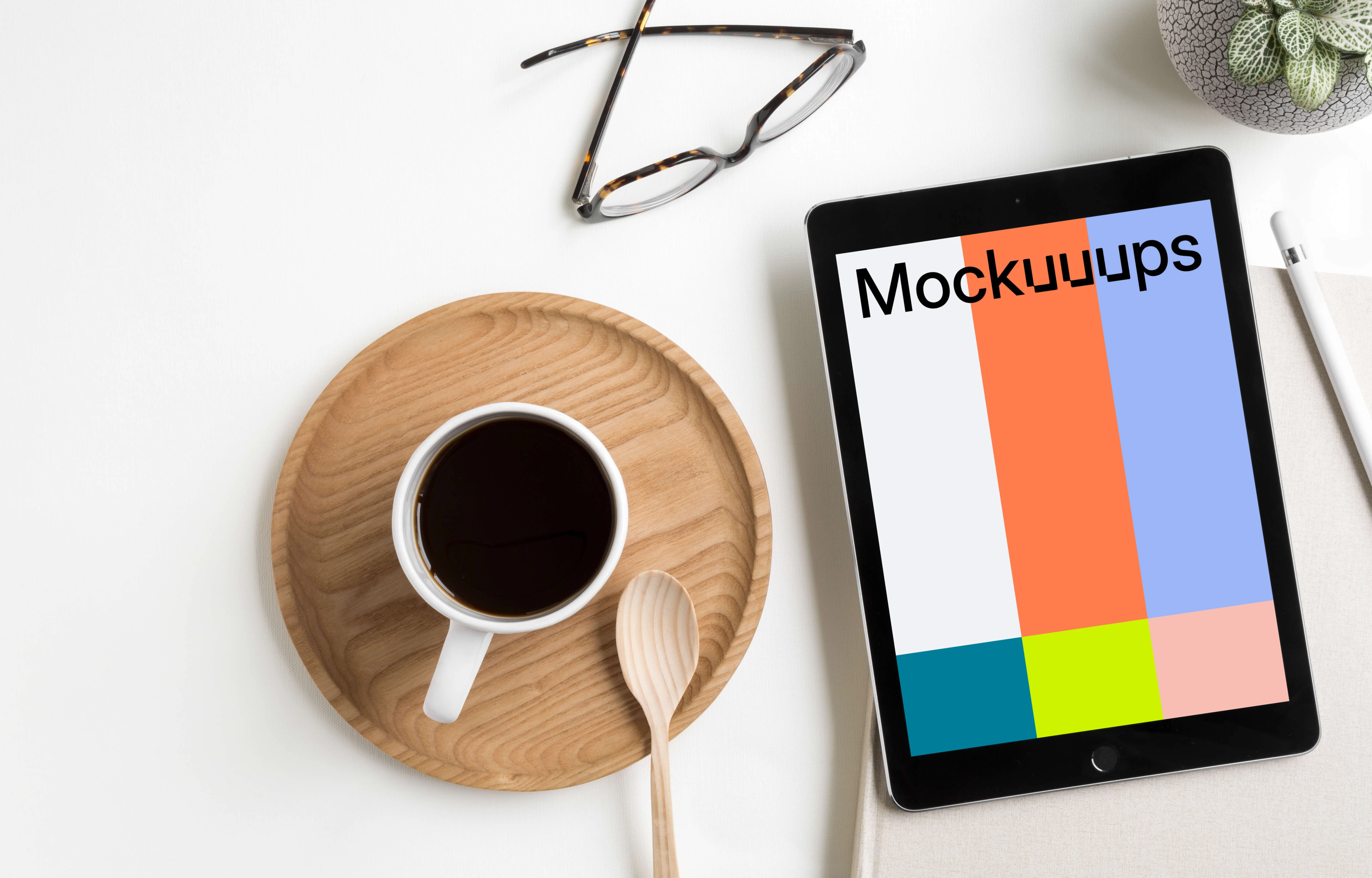 Free iPad Pro mockup on white table