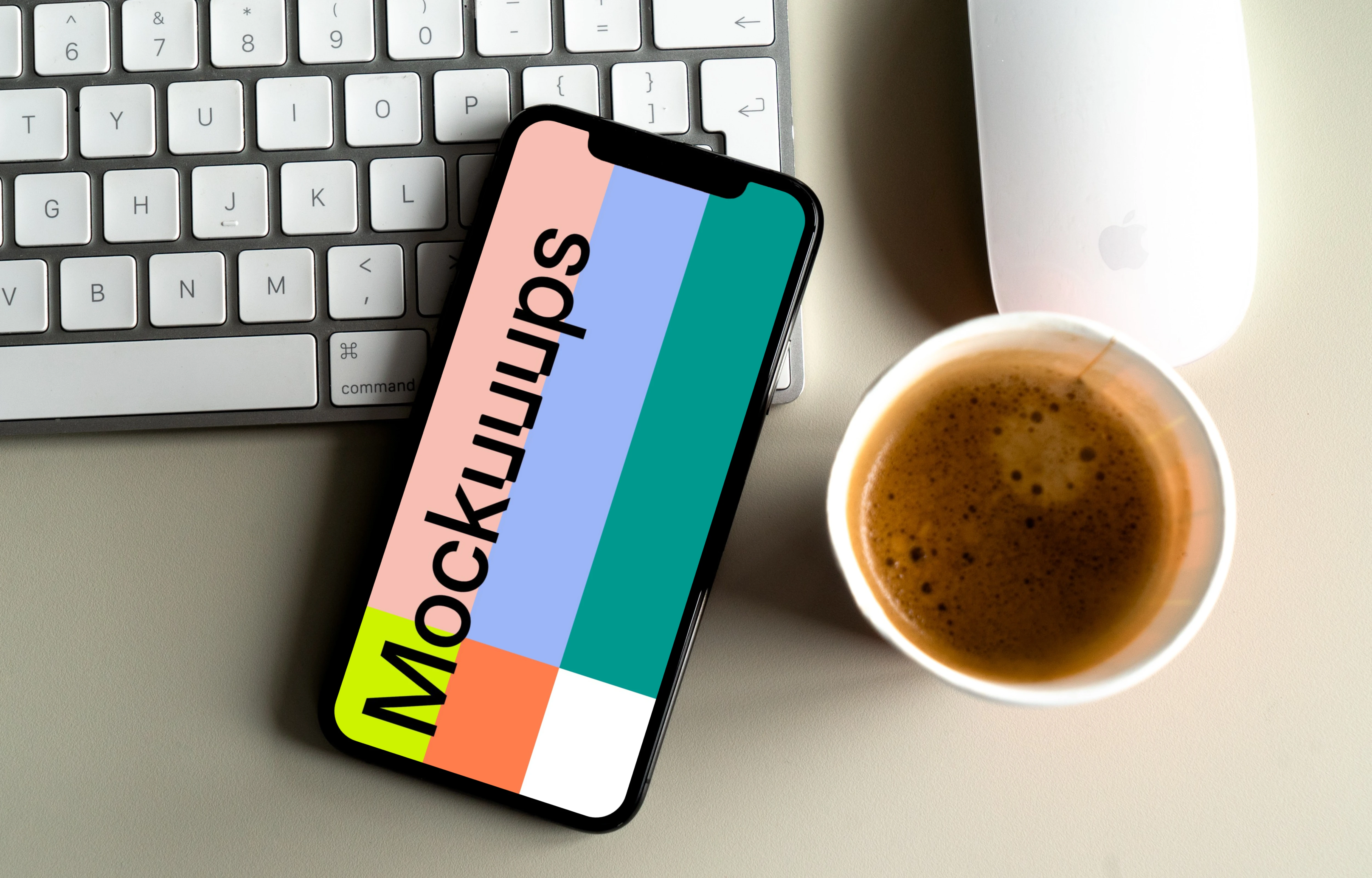 iPhone 12 mockup beside a cup of coffee