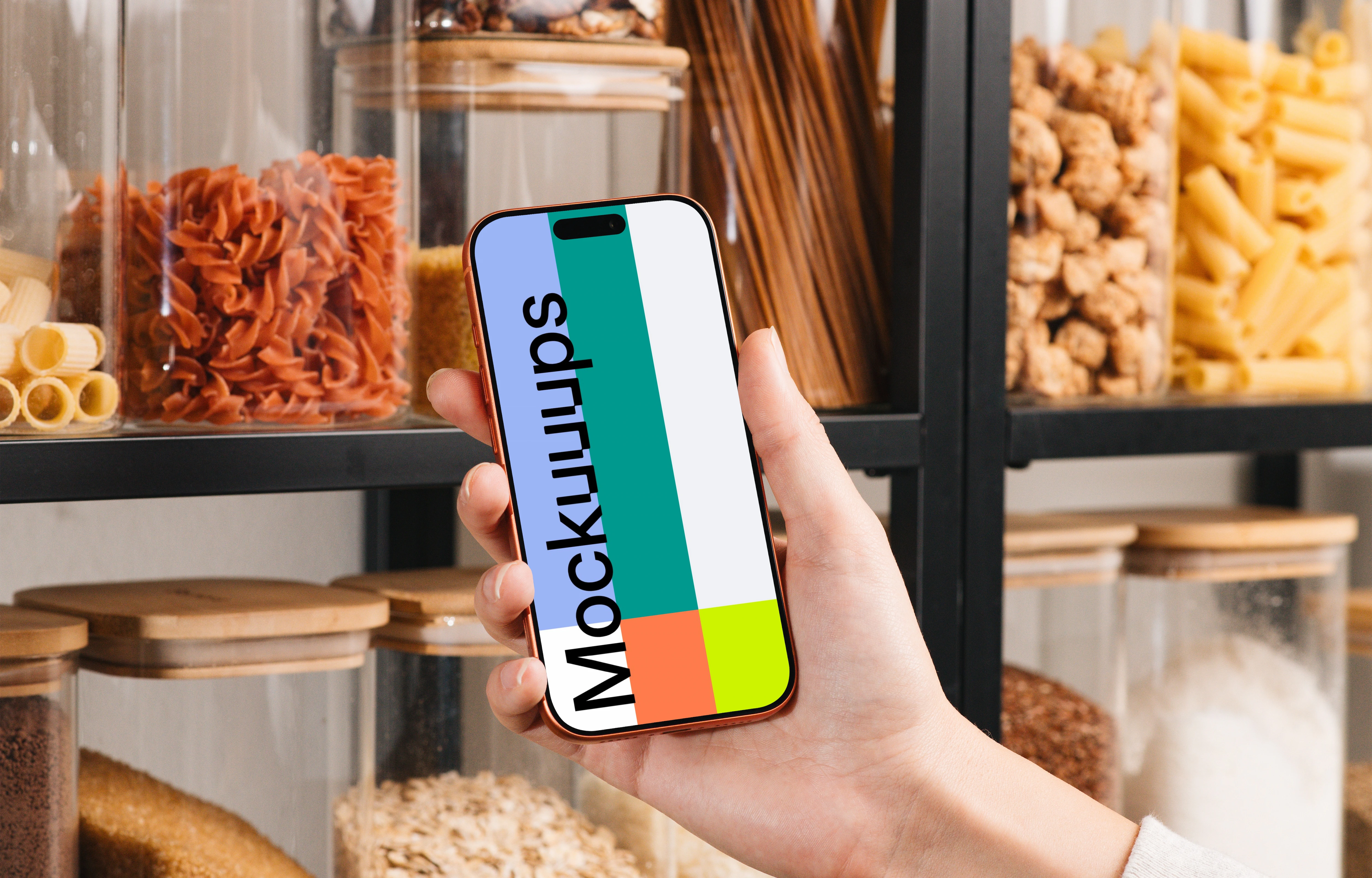 iPhone 17 Pro mockup held in a kitchen setting