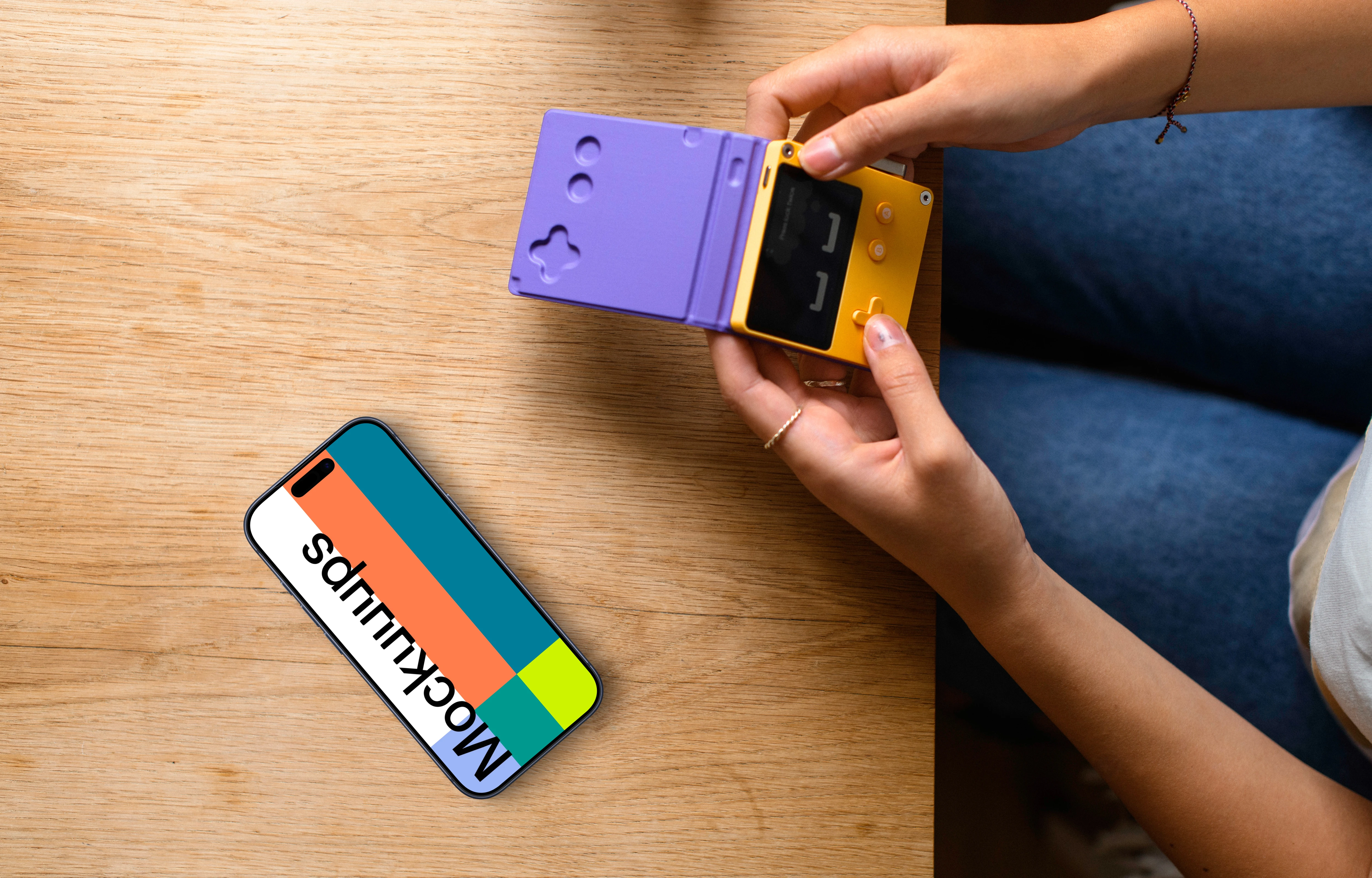 Smartphone and portable game console mockup at home