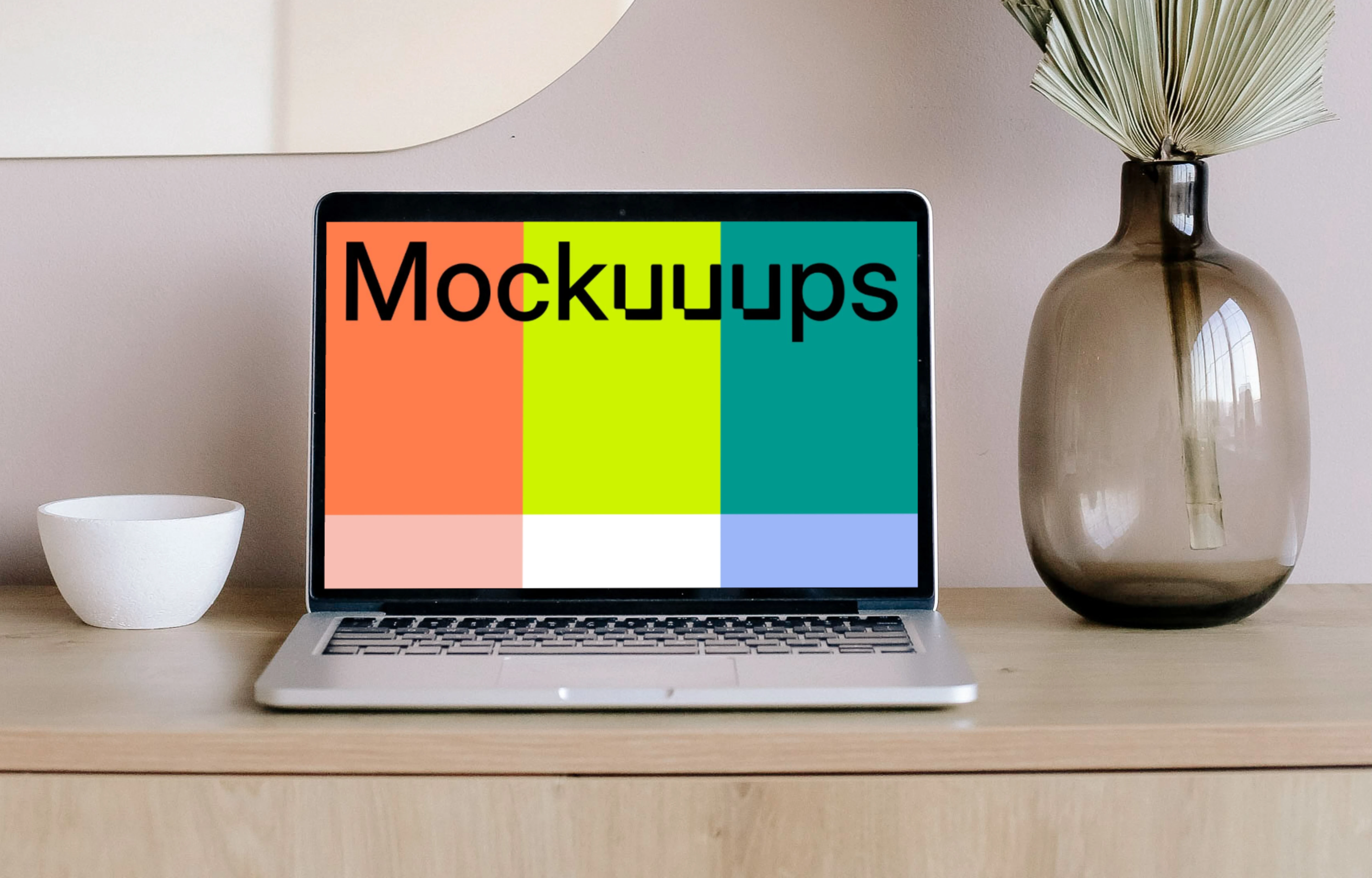 MacBook mockup on a table with mirror in the background 