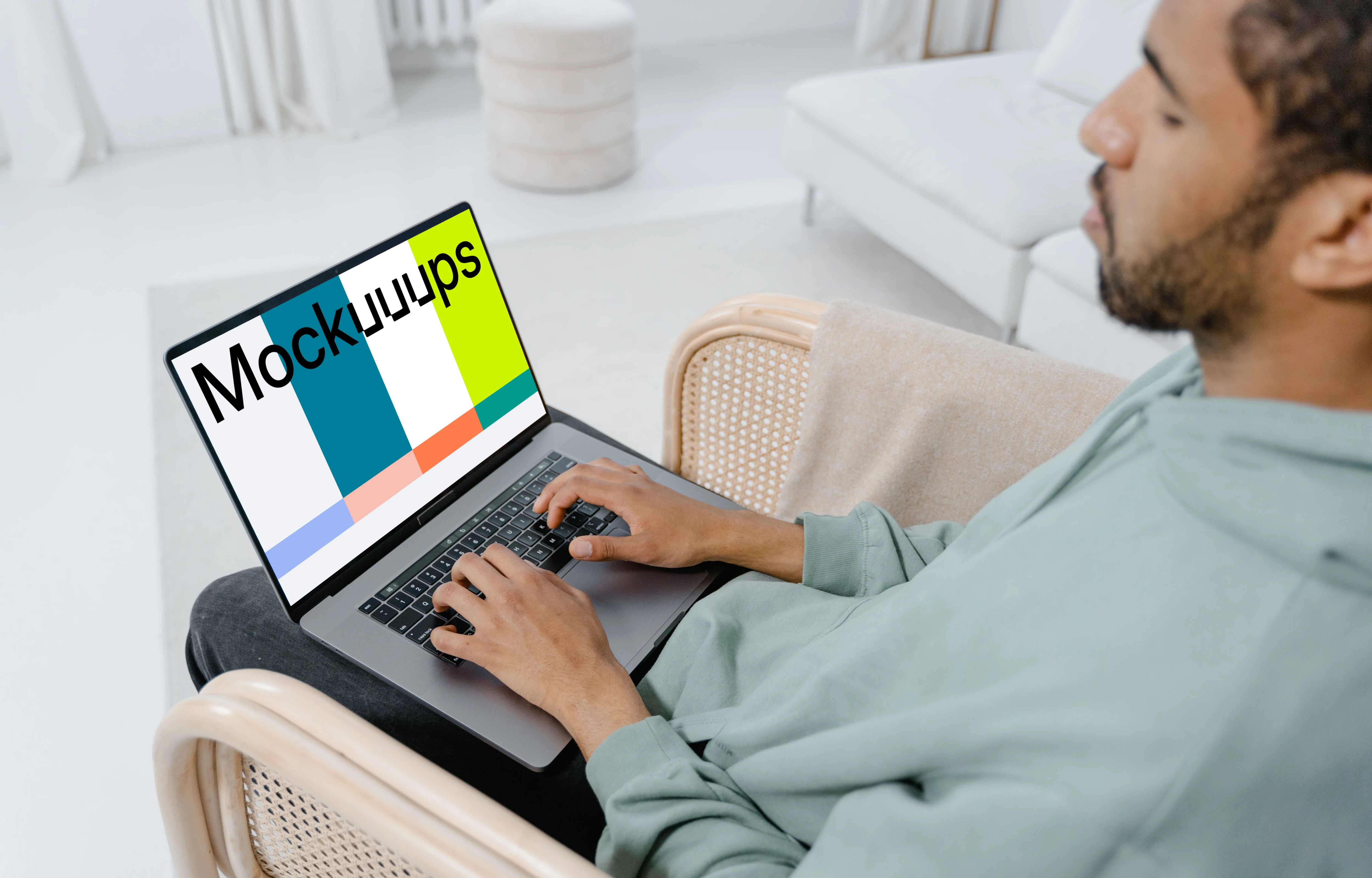MacBook mockup on a user’s lap