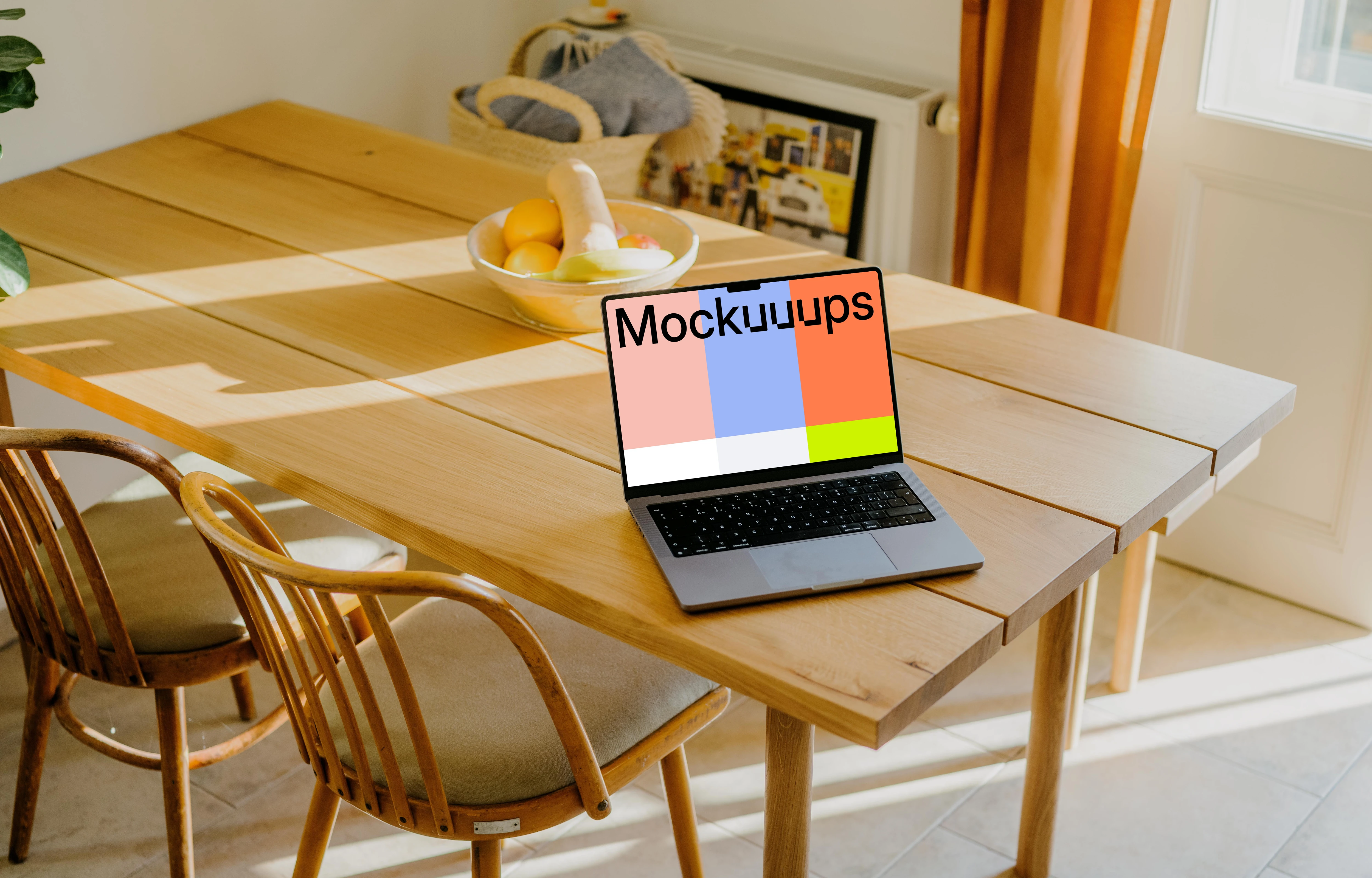 MacBook Pro mockup at dining table setup