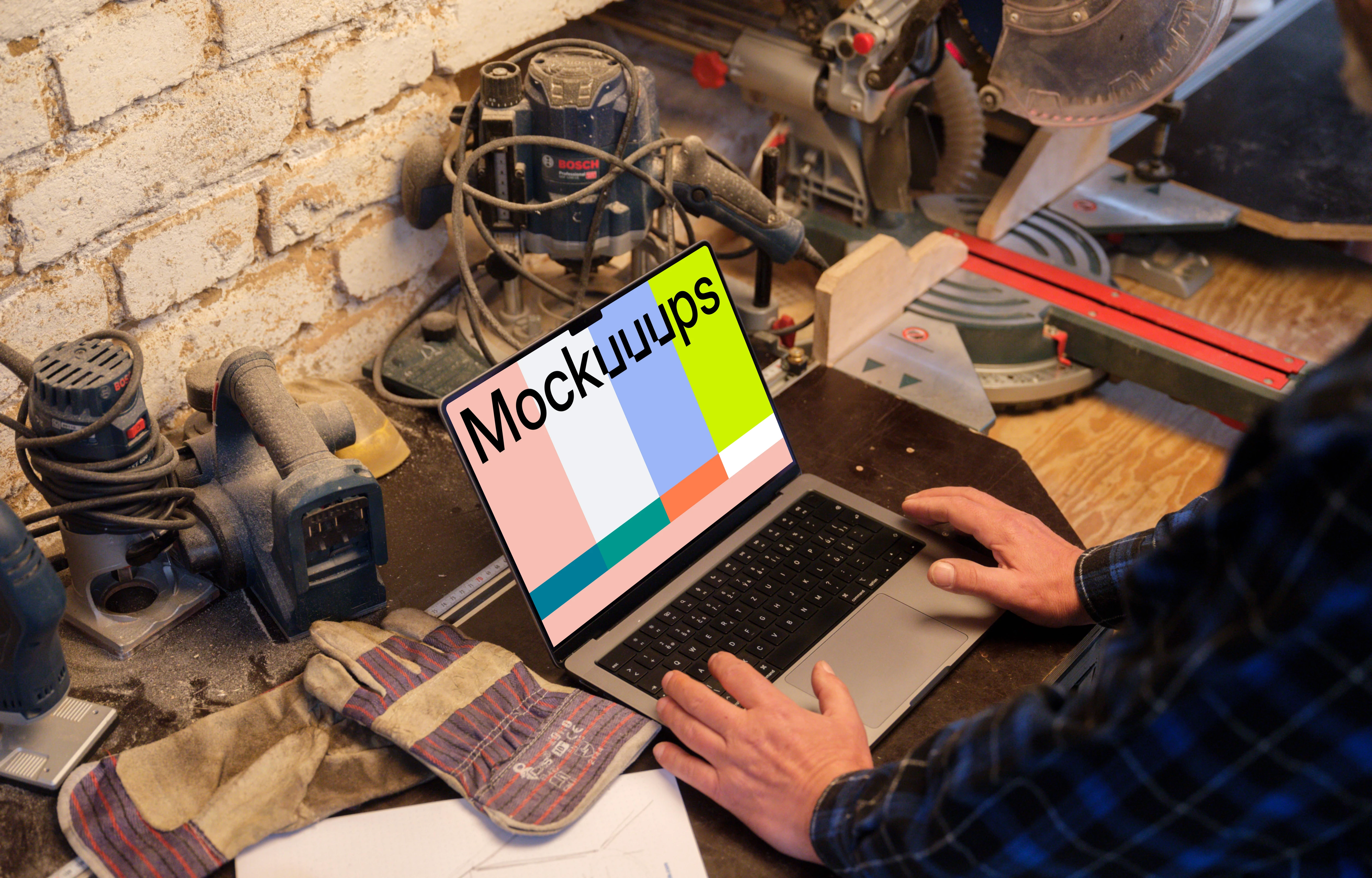 Mechanic working on a MacBook Pro mockup