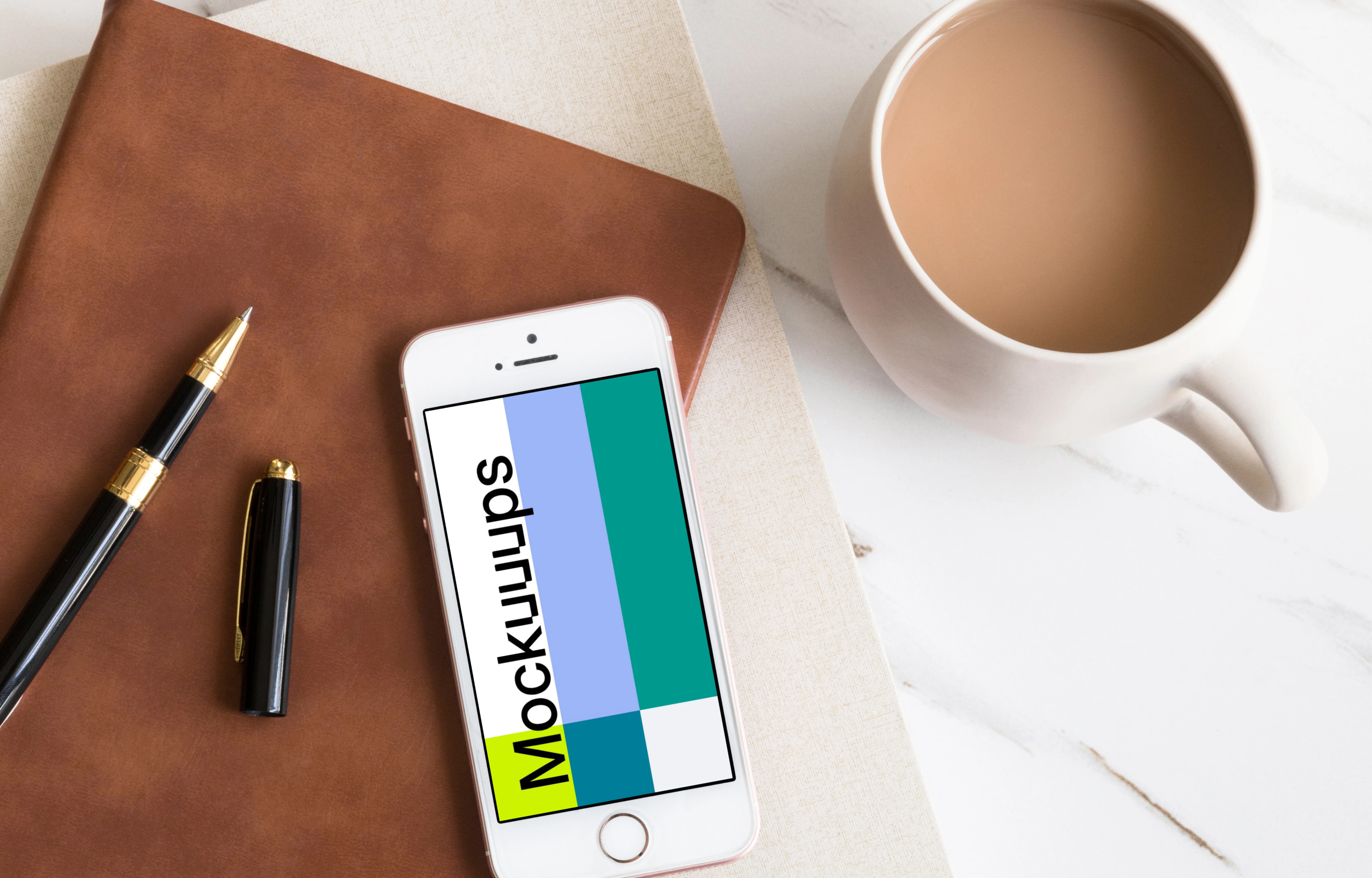 Coffee and iPhone SE mockup placed on marble table