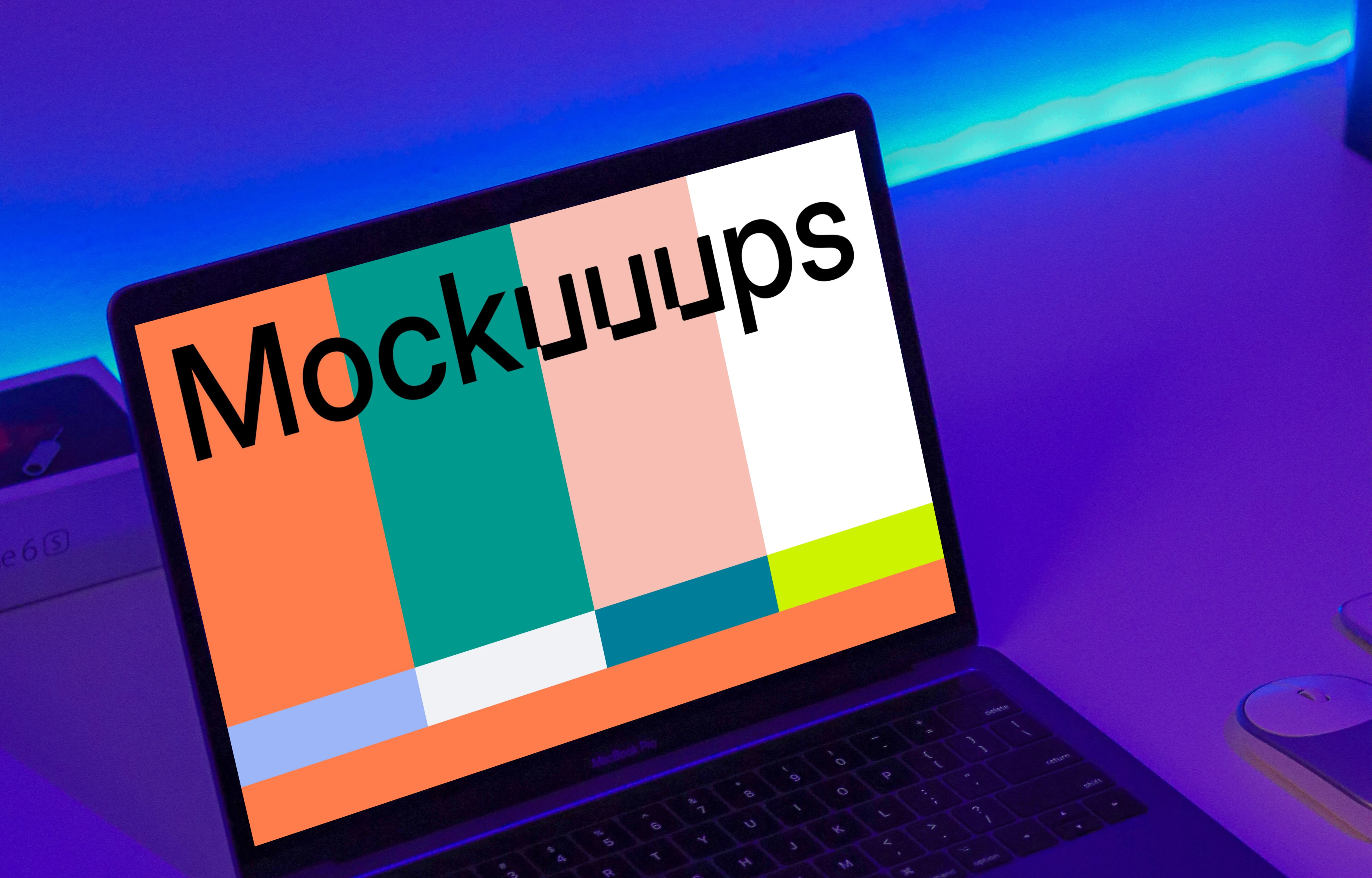 Night MacBook mockup on a table with Airpod case