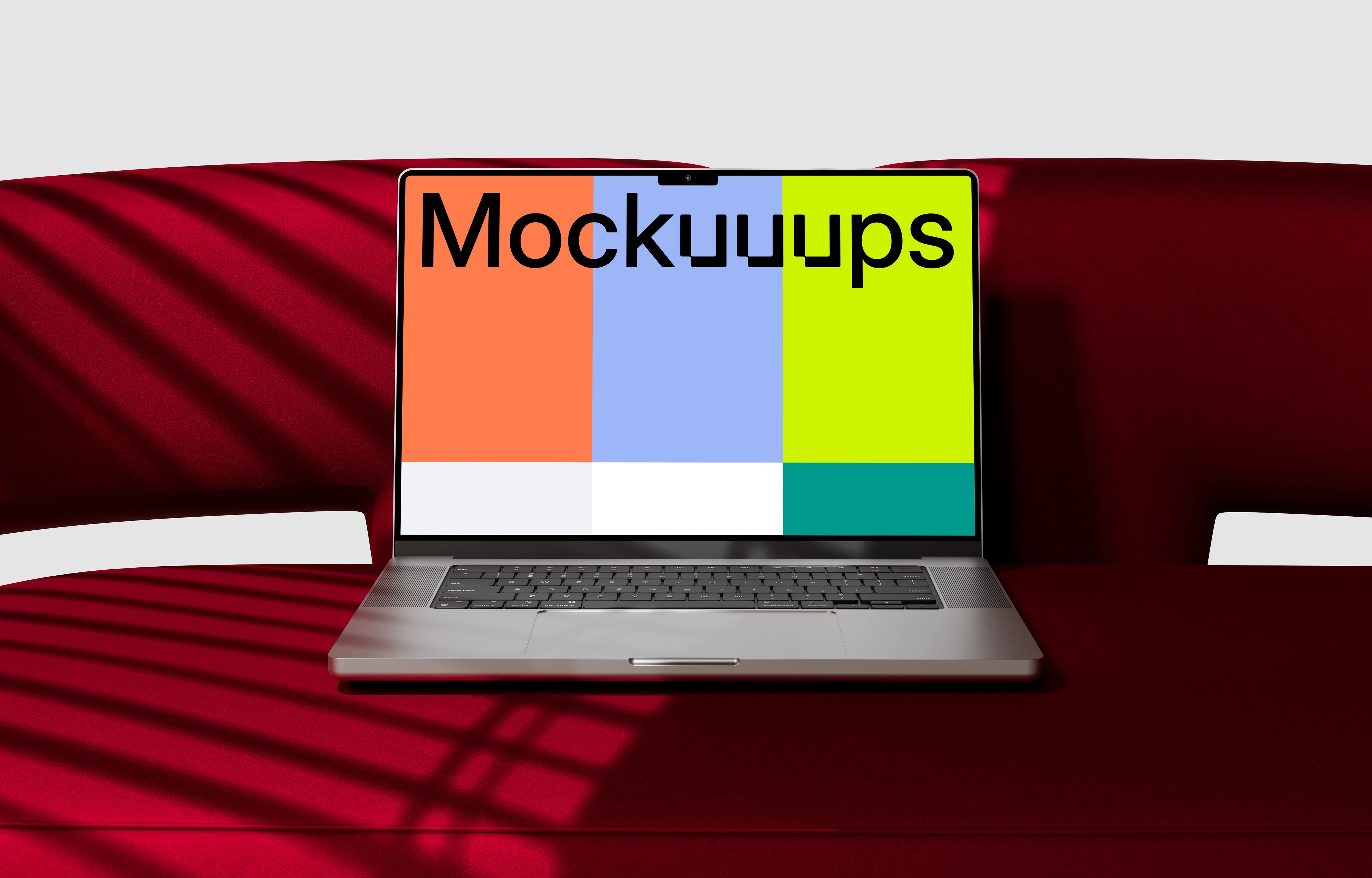MacBook Pro mockup on a modern red couch