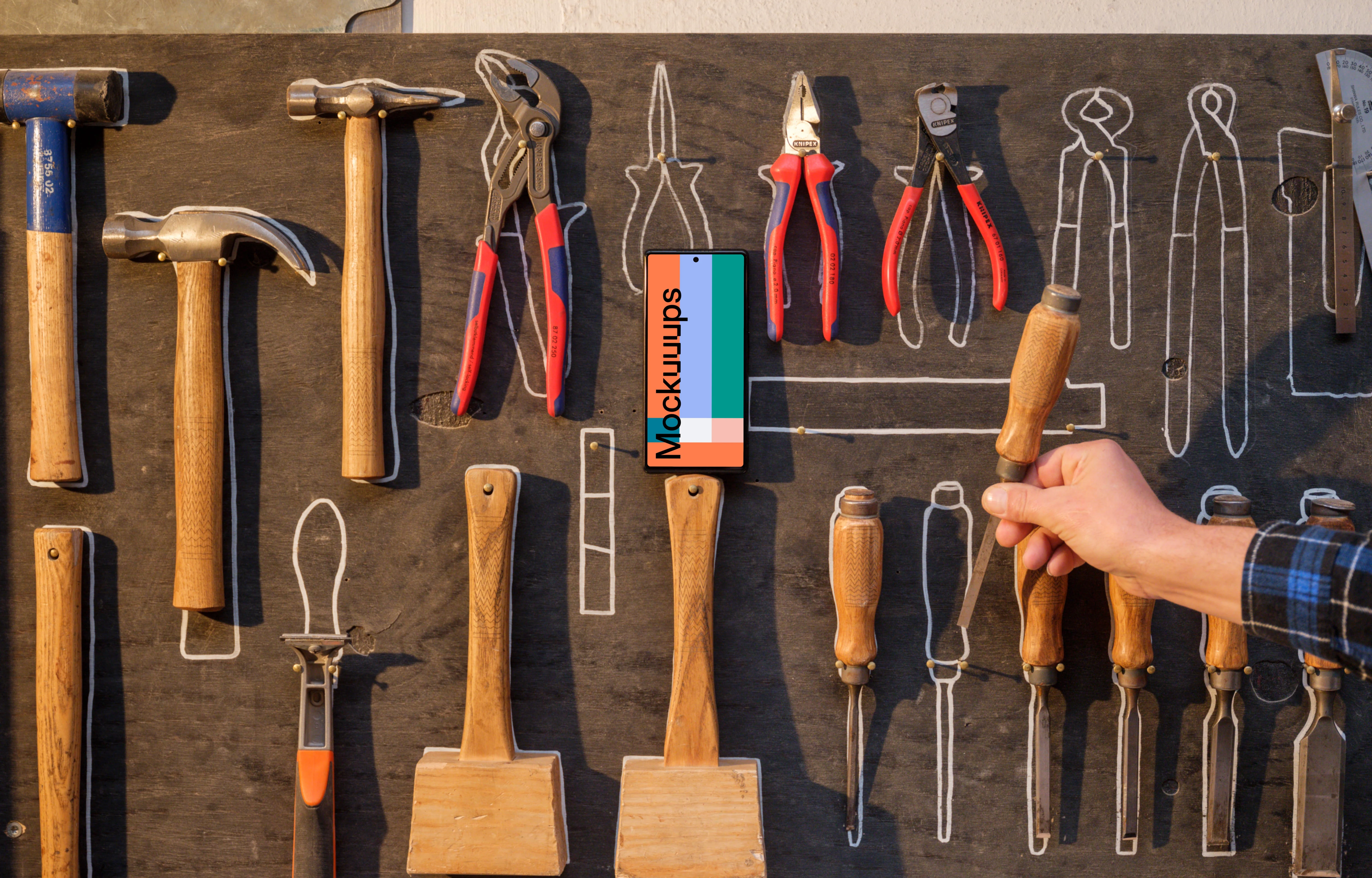 Phone mockup on the wall with tools