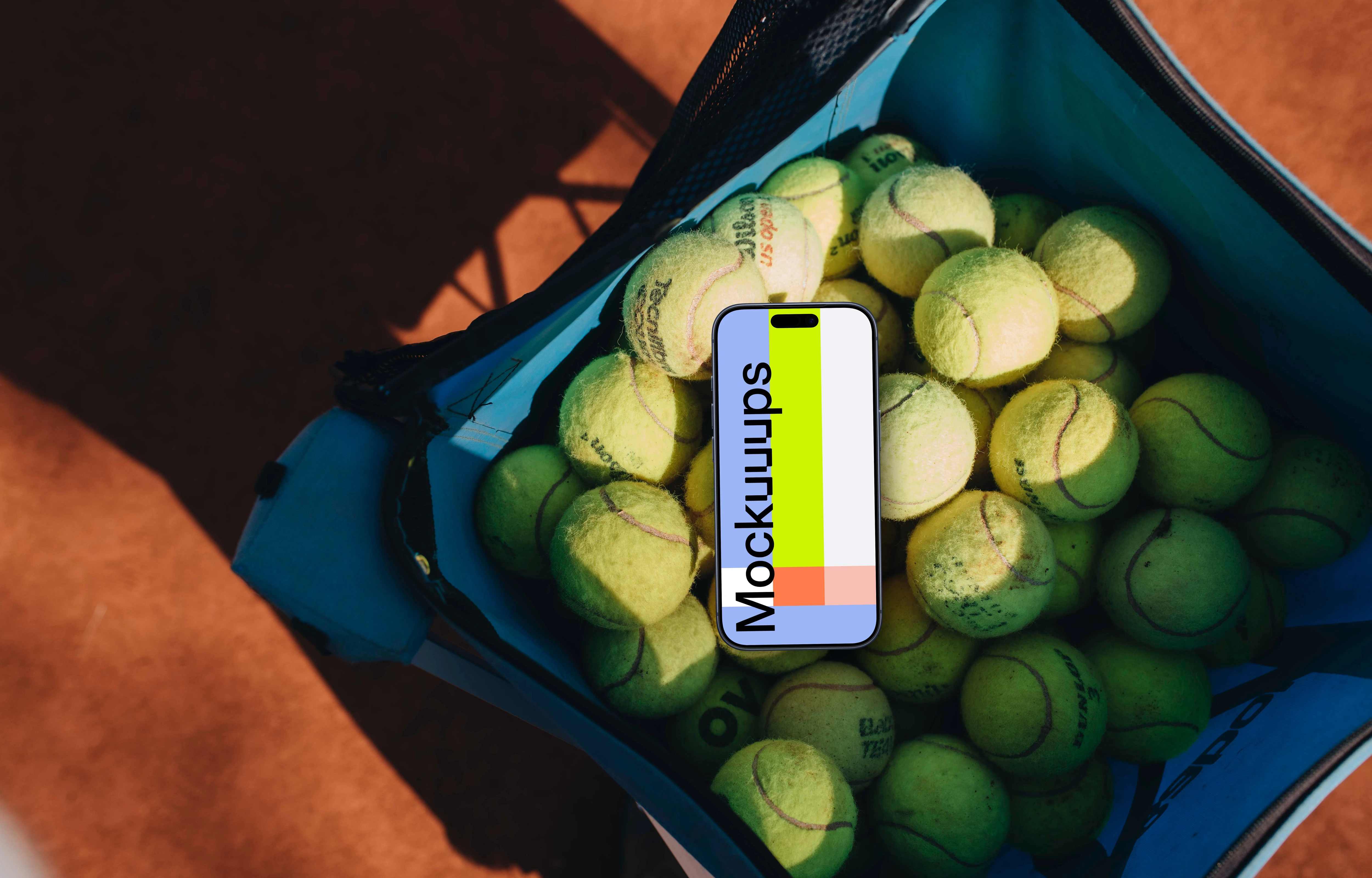 iPhone mockup in a bag full of tennis balls