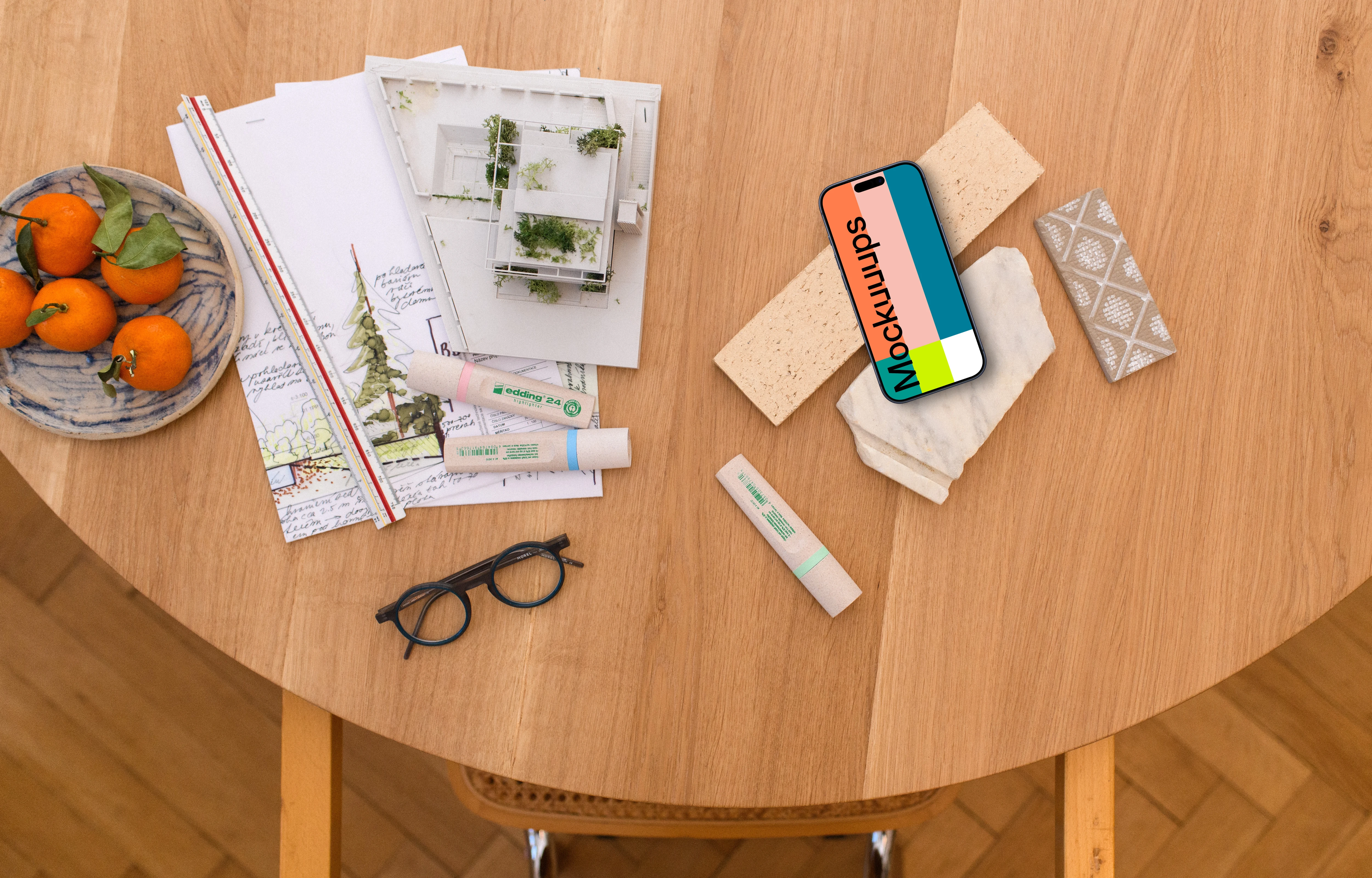 Smartphone mockup with architect's blueprint and tools