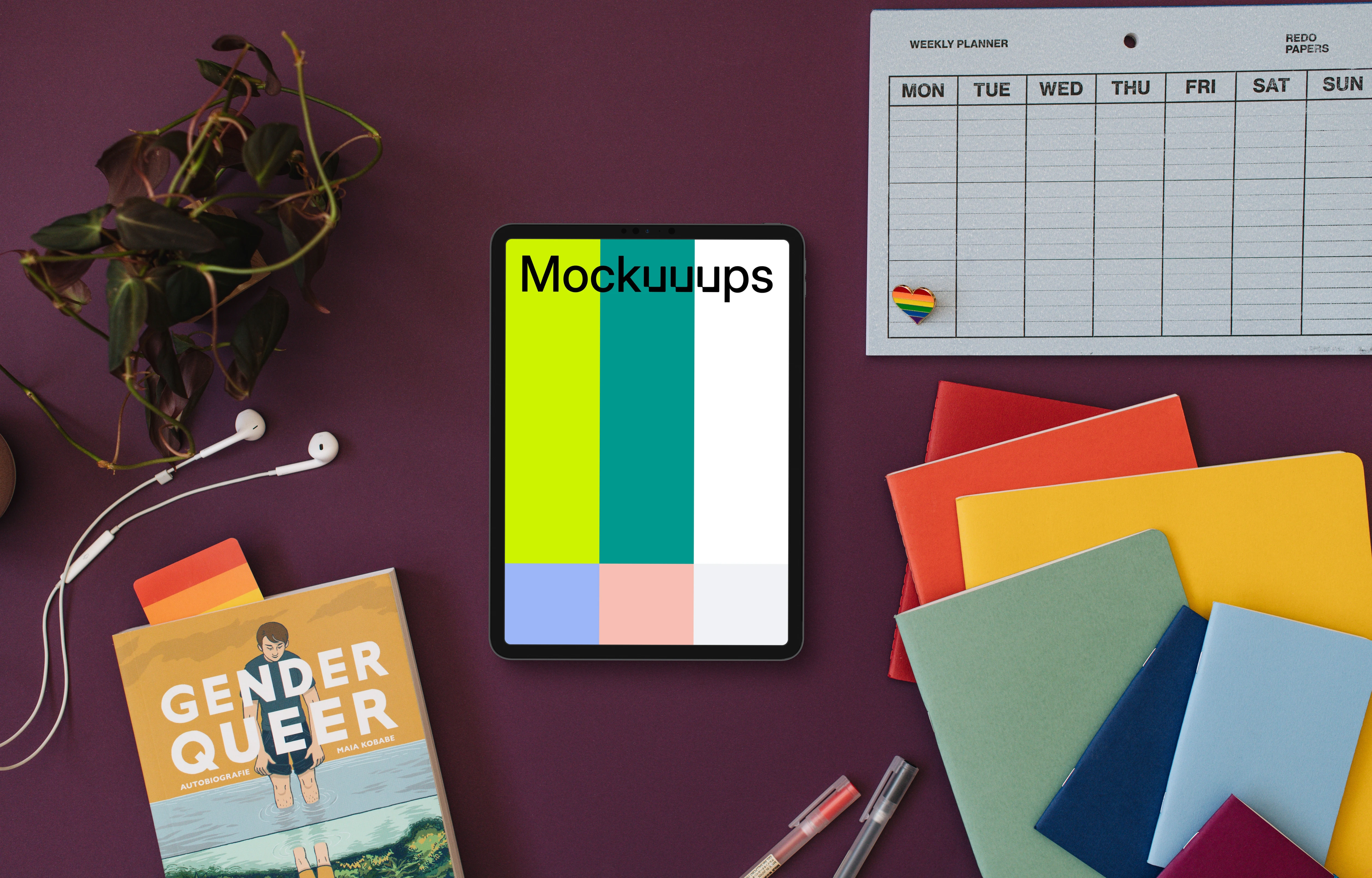 Tablet mockup in a purple scene with pride themed decorations