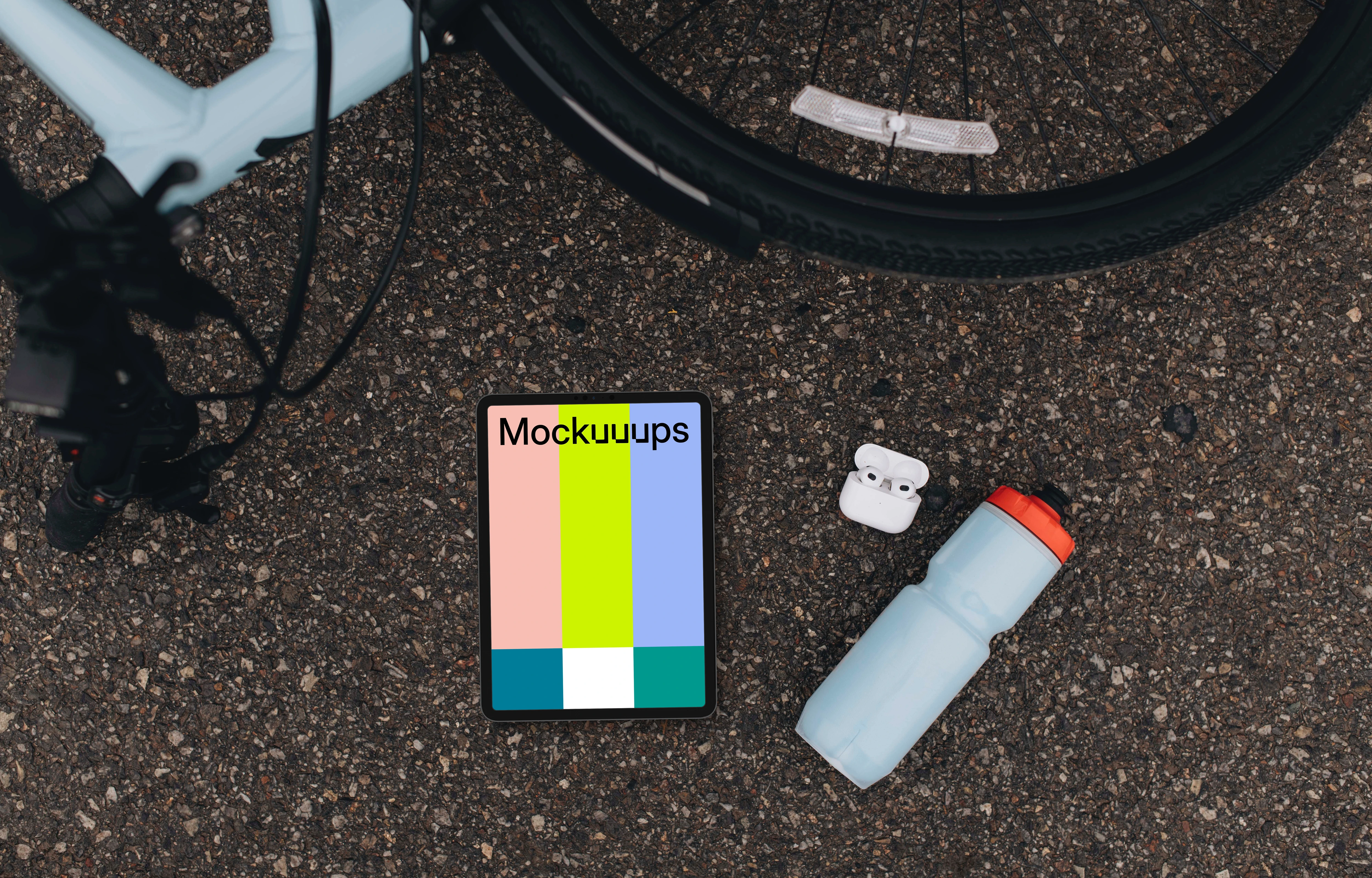 Tablet mockup next to the bike