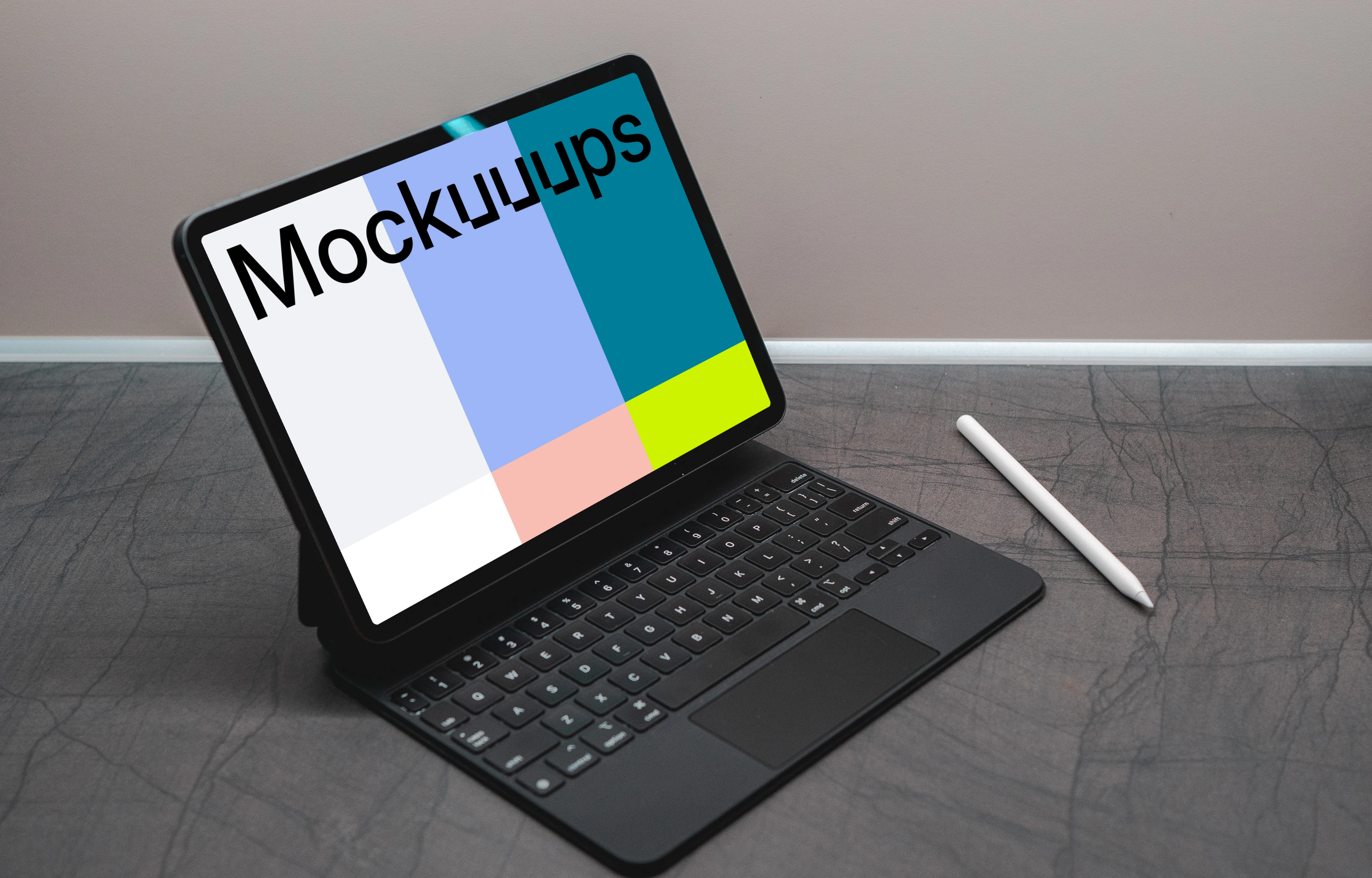 Tablet mockup on a black table with an Apple pencil at the side.