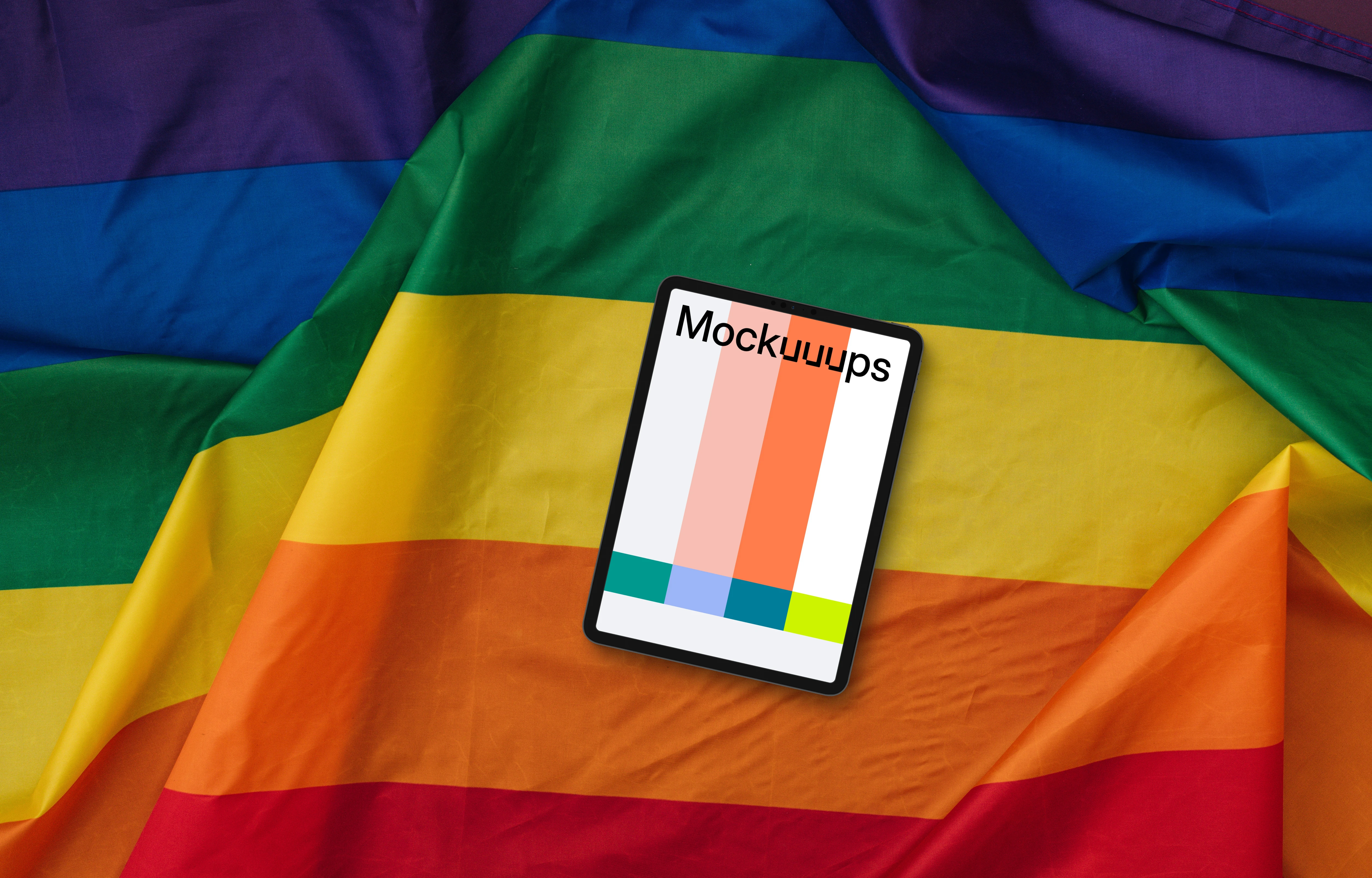 Tablet mockup on a large pride flag
