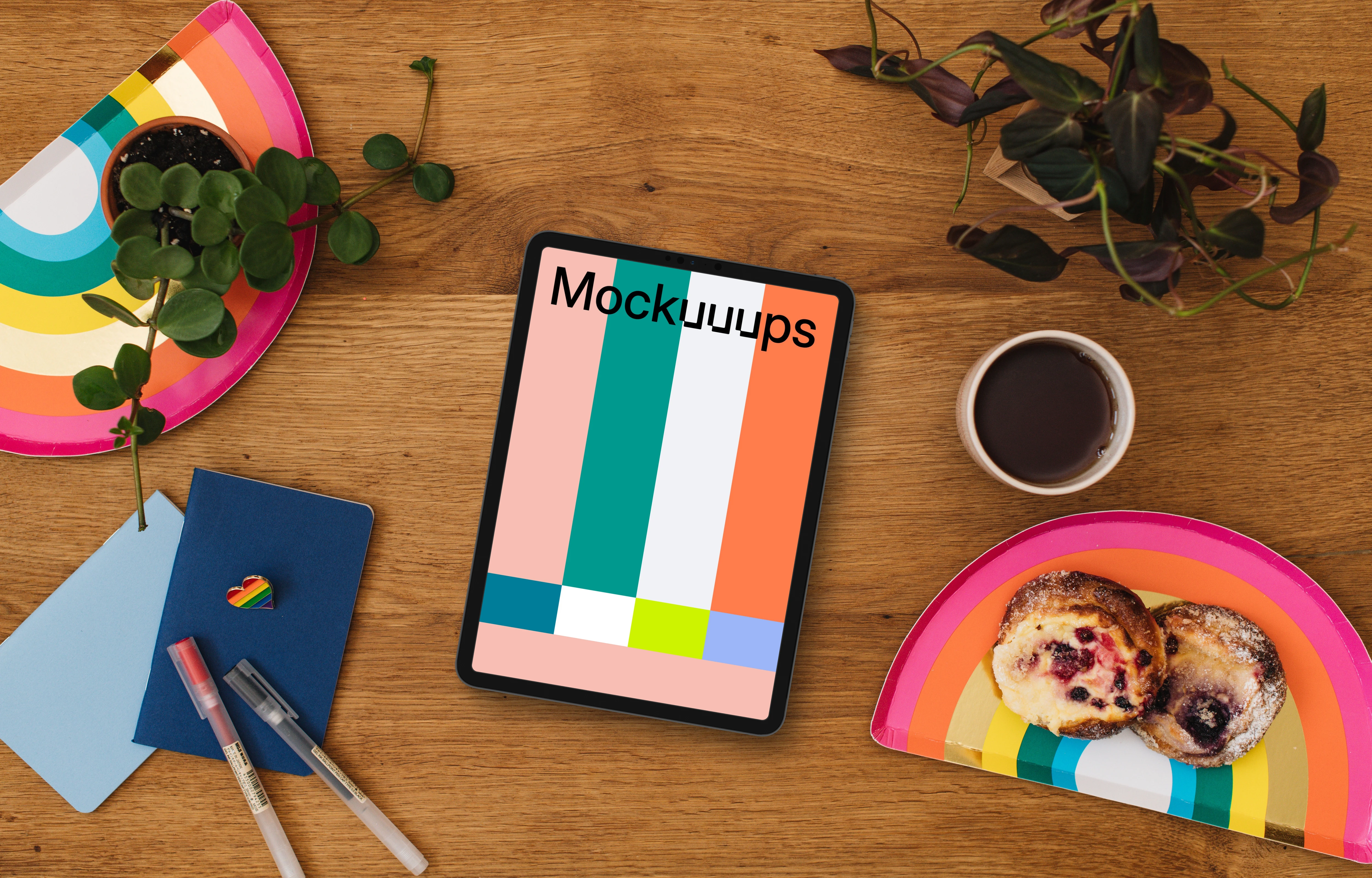 Tablet mockup with rainbow trays and a rainbow heart pin