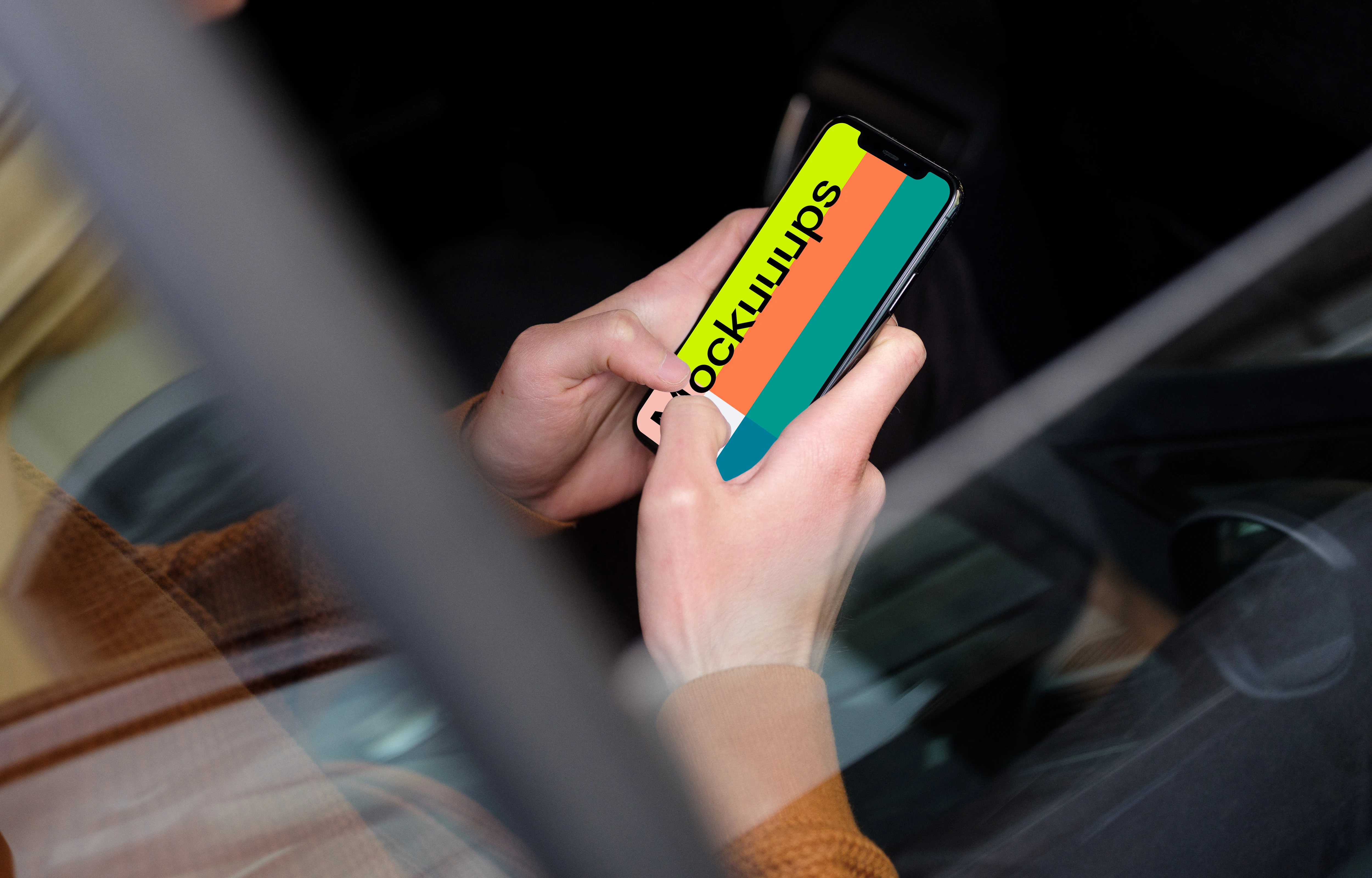 Over the shoulder view of passenger typing on iPhone 11 mockup