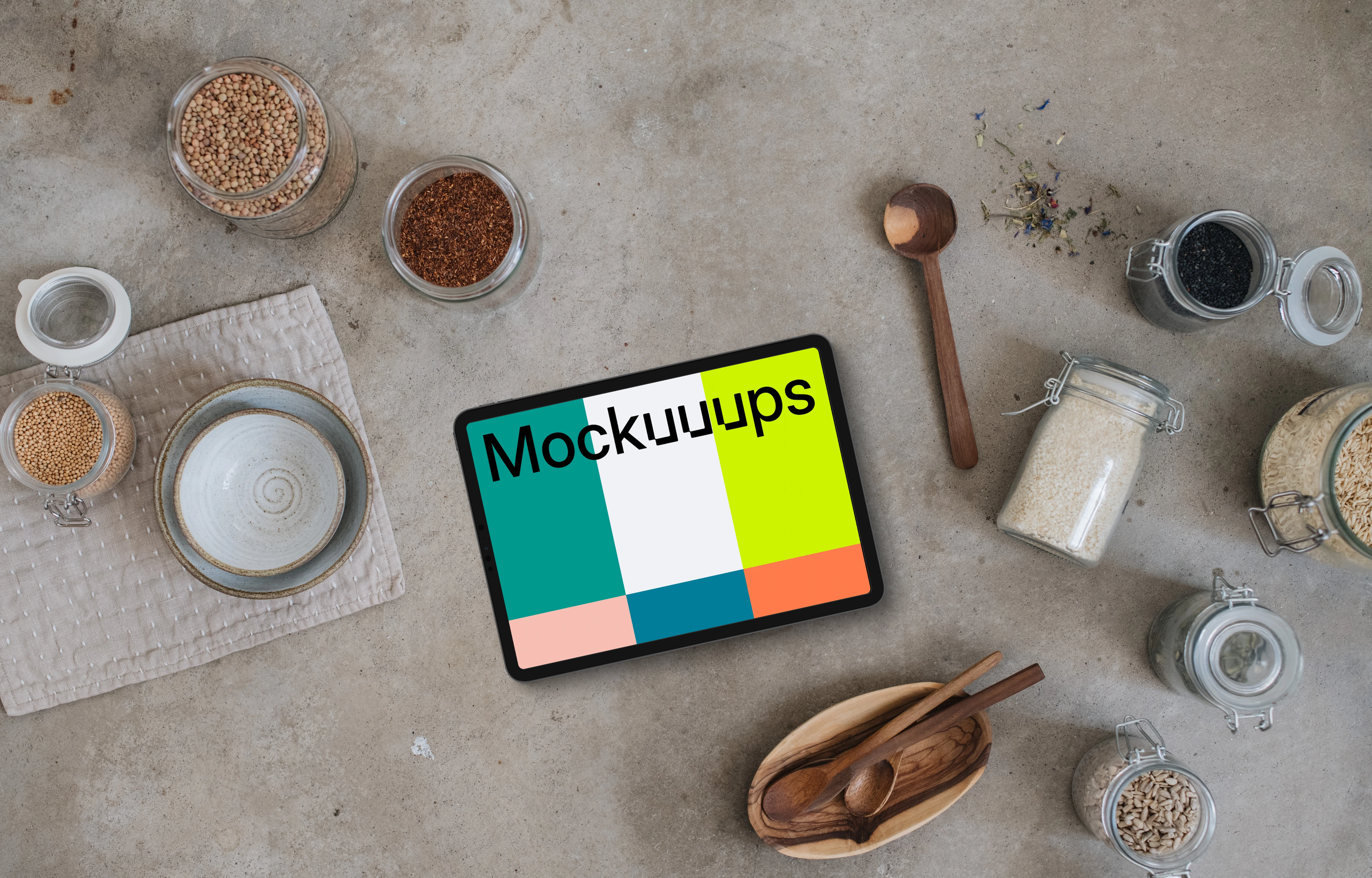 Landscape tablet mockup next to the jars