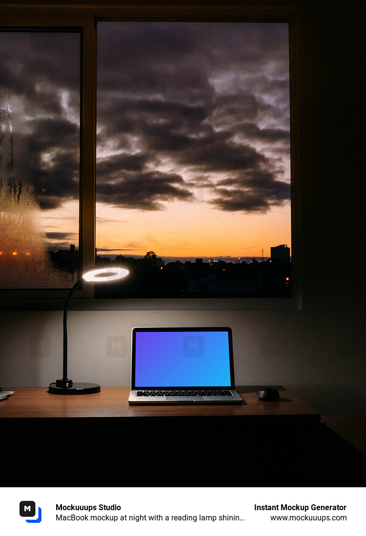 MacBook mockup at night with a reading lamp shining over it