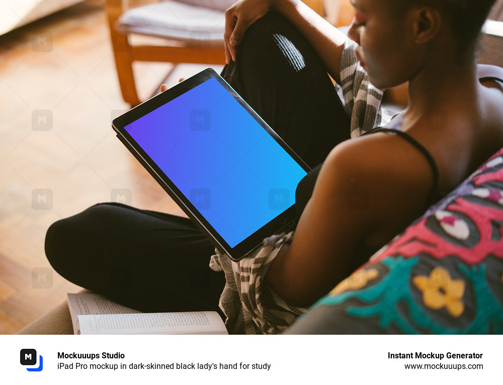 iPad Pro mockup in dark-skinned black lady's hand for study