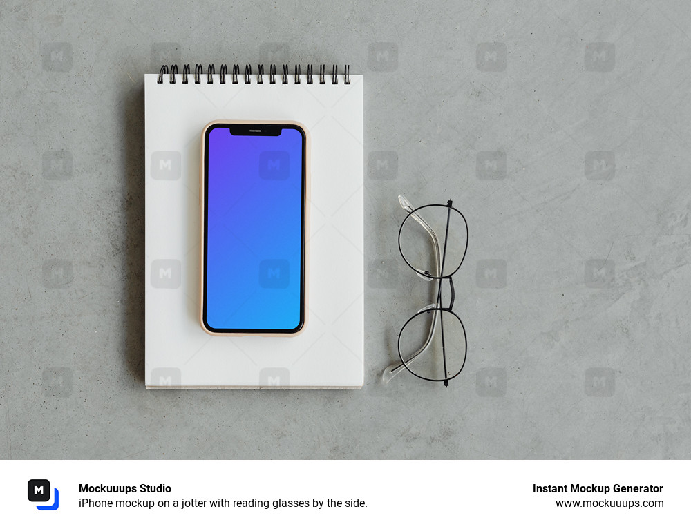 iPhone mockup on a jotter with reading glasses by the side.