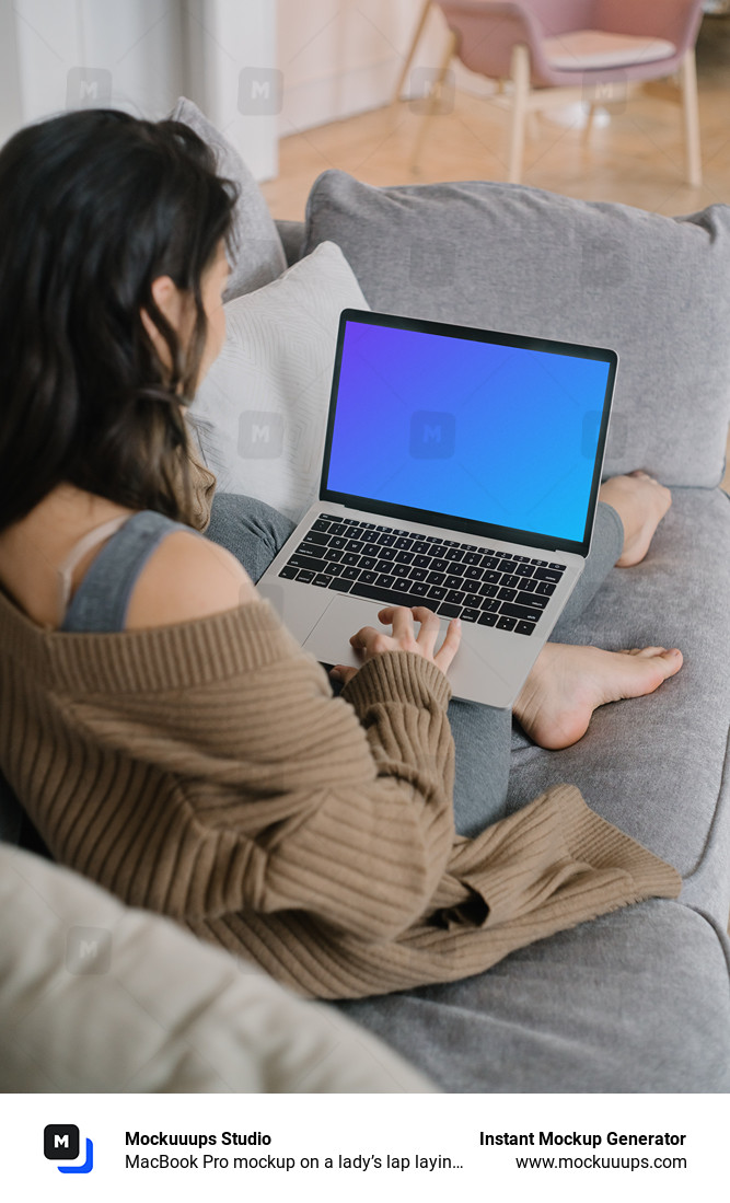 MacBook Pro mockup on a lady’s lap laying on a couch