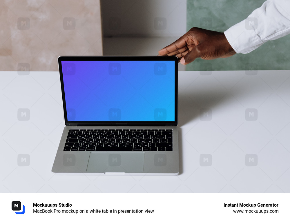 MacBook Pro mockup on a white table in presentation view