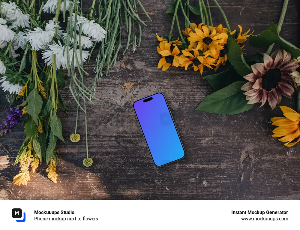 Phone mockup next to flowers
