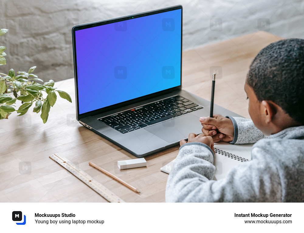 Young boy using laptop mockup