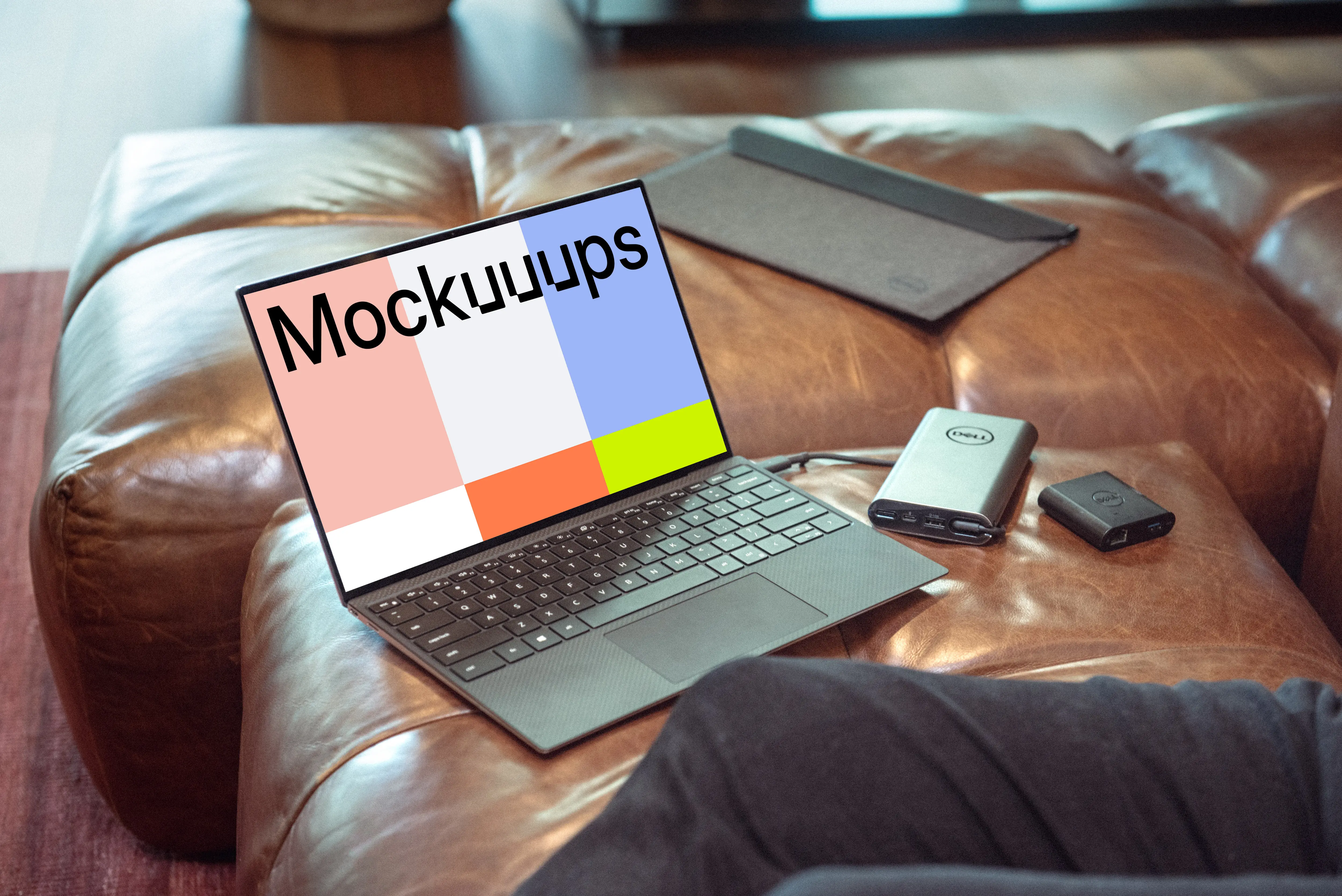 Dell XPS mockup on sofa with charger
