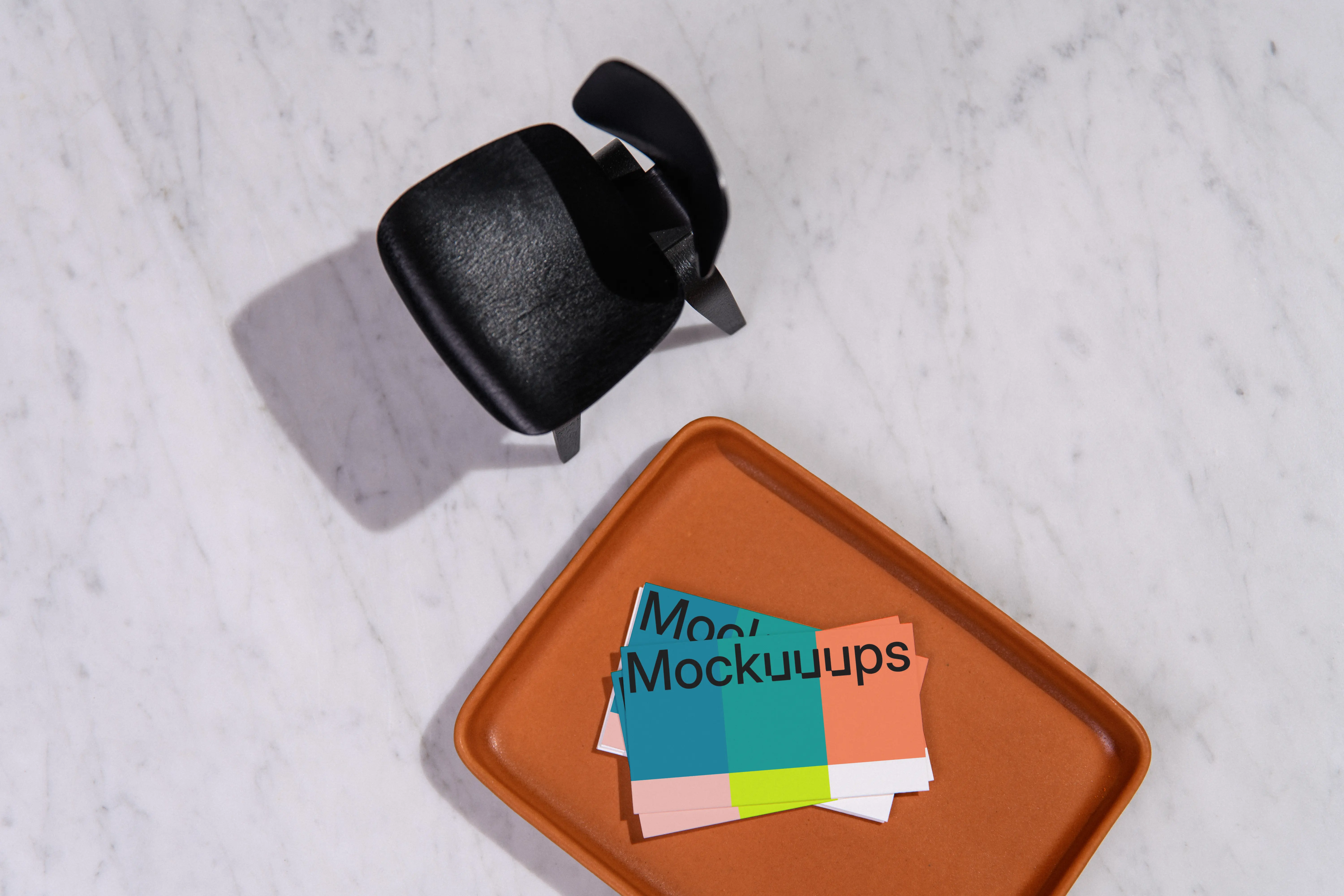 Business card mockup on a marble surface