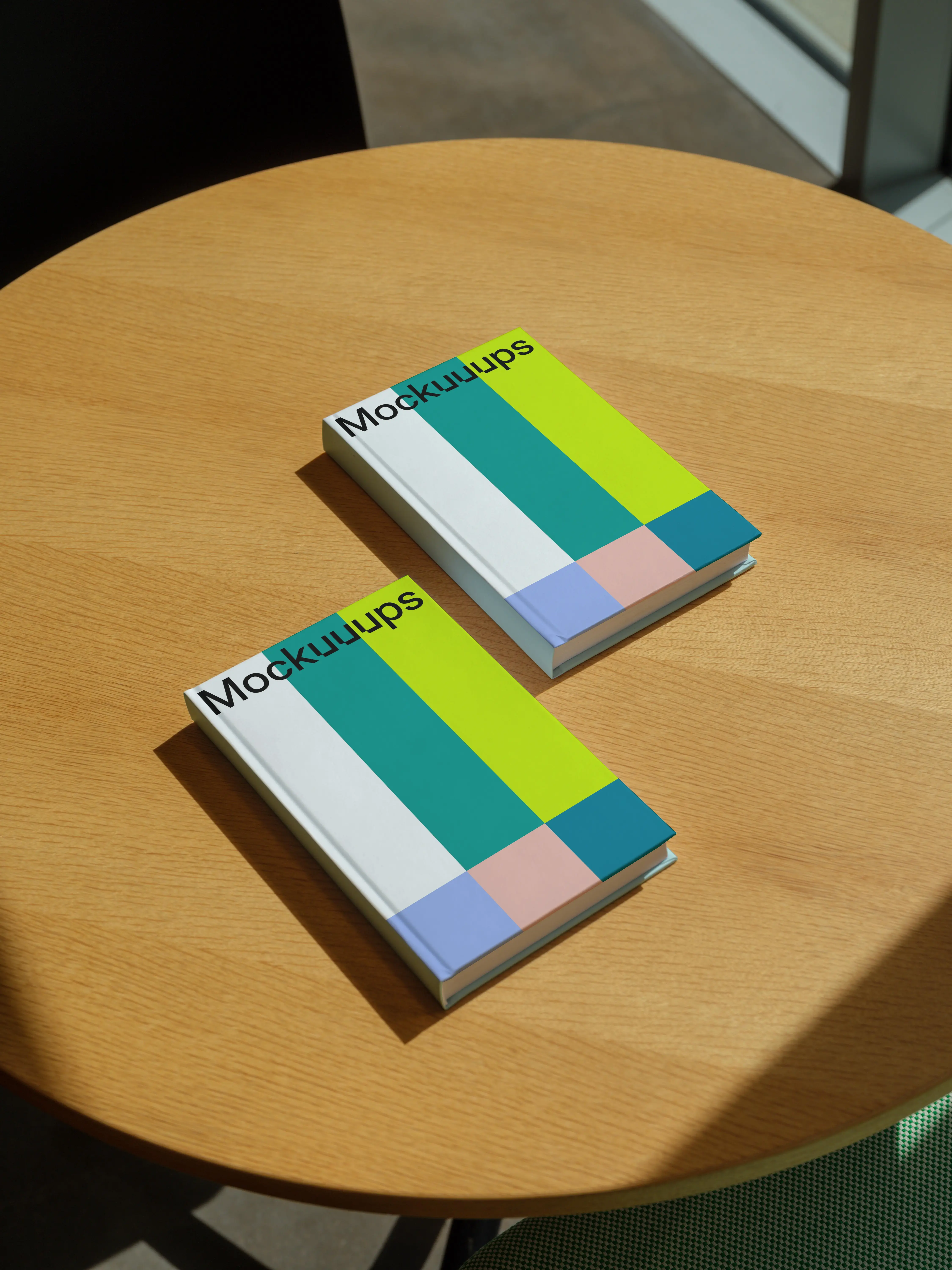 C-format book mockup on a wooden table