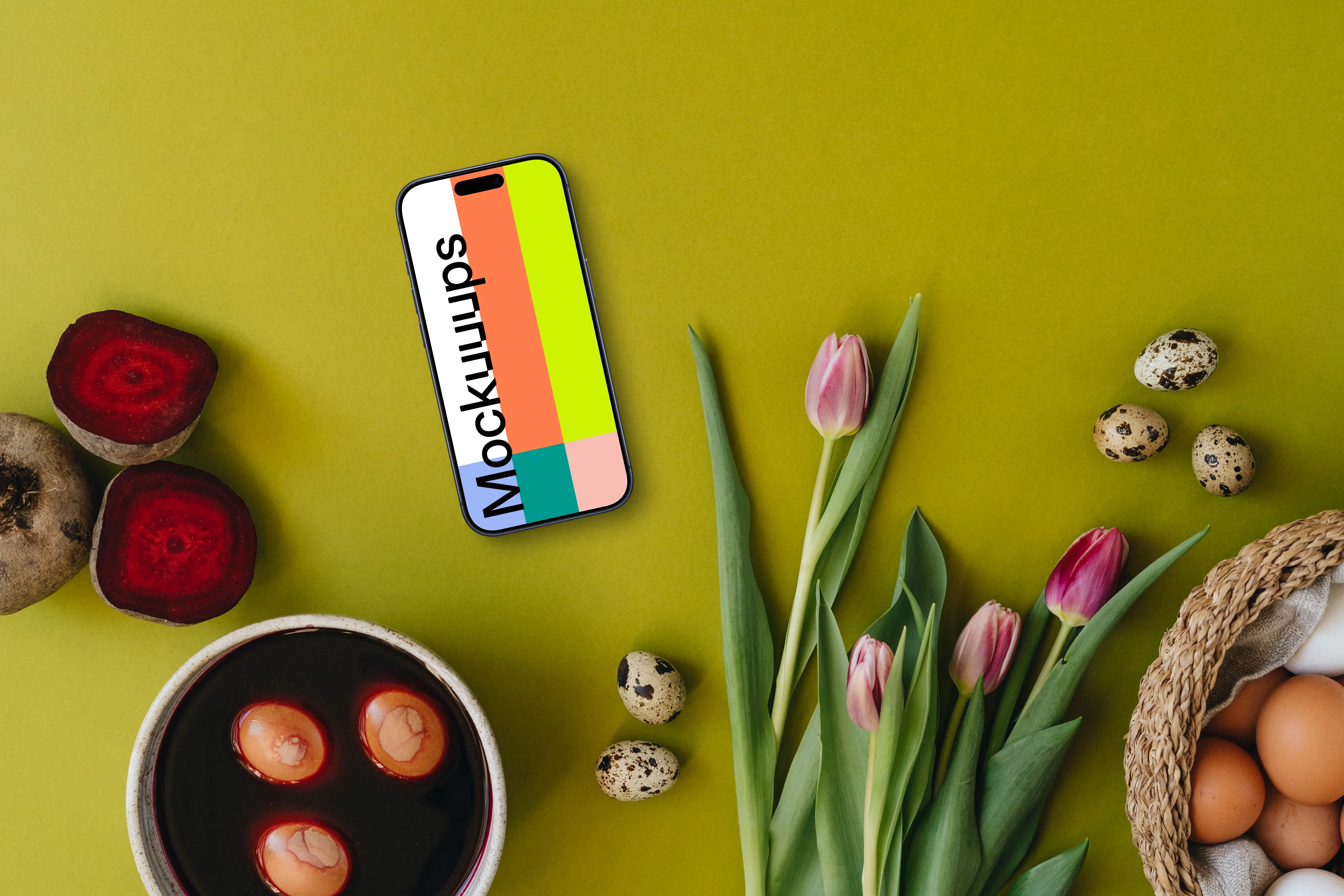 Coloring Easter eggs next to tulips and smartphone mockup