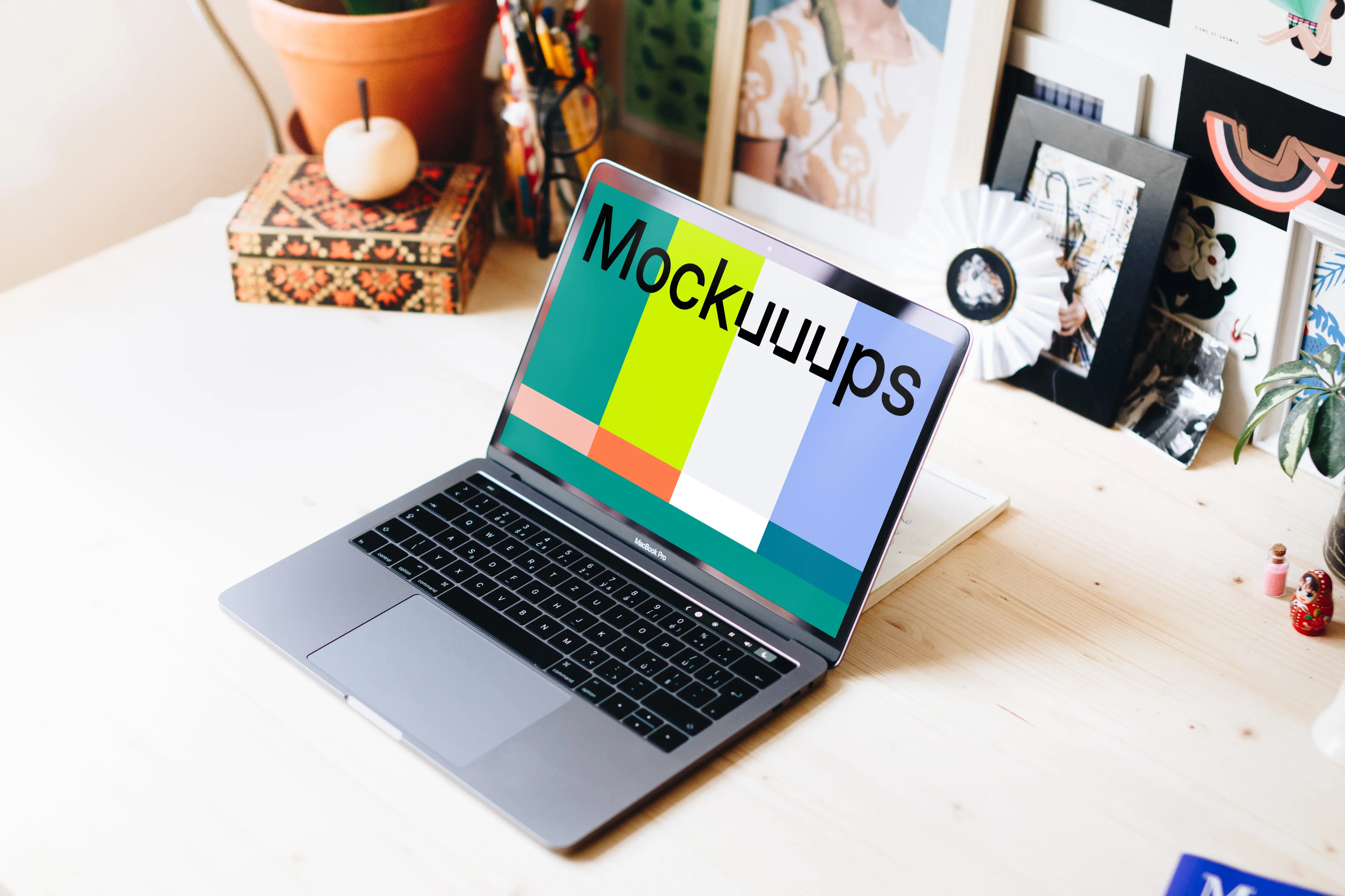 Creative workplace with Macbook Pro mockup