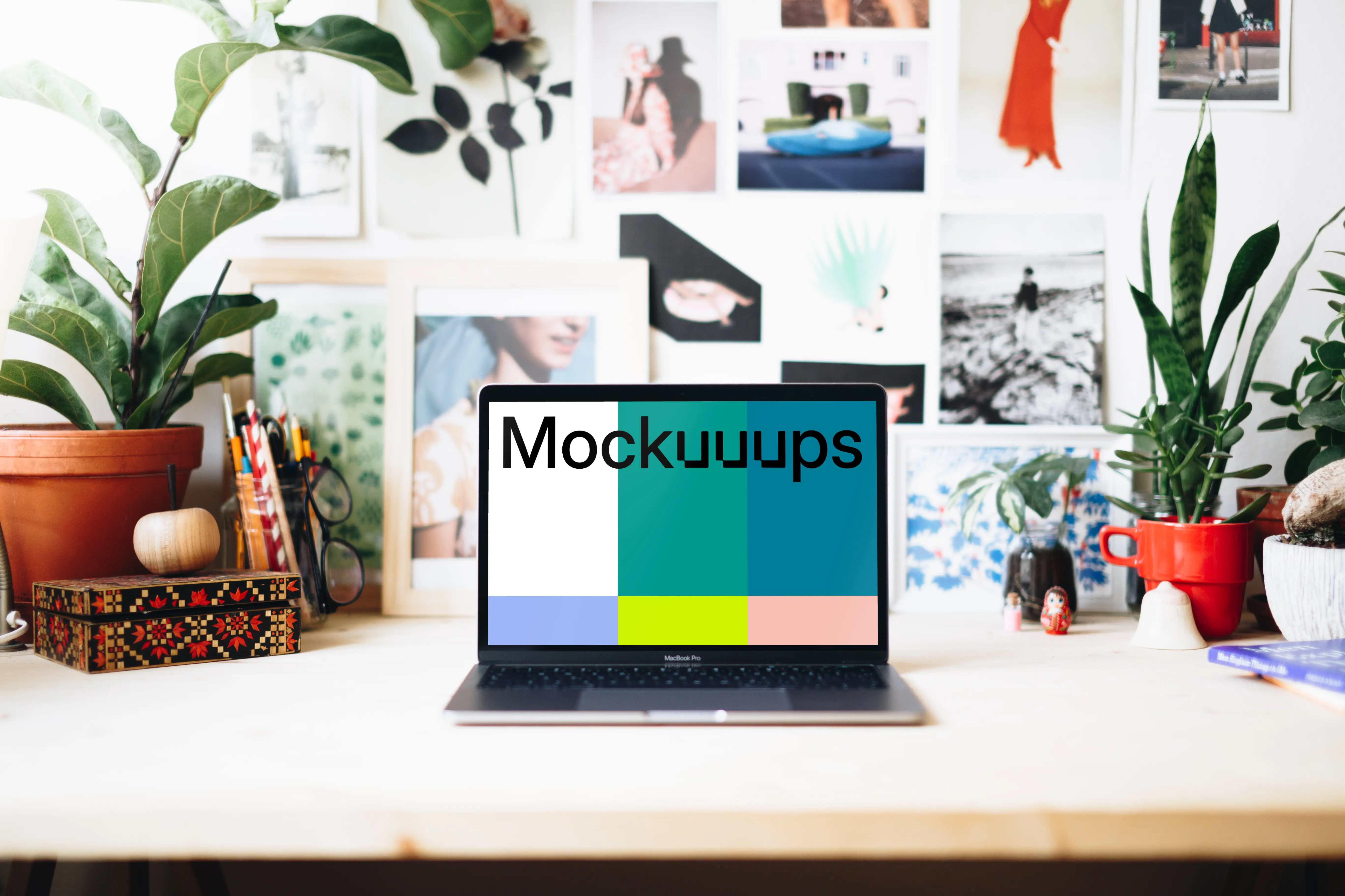 Creative workspace mockup with front view of Macbook Pro