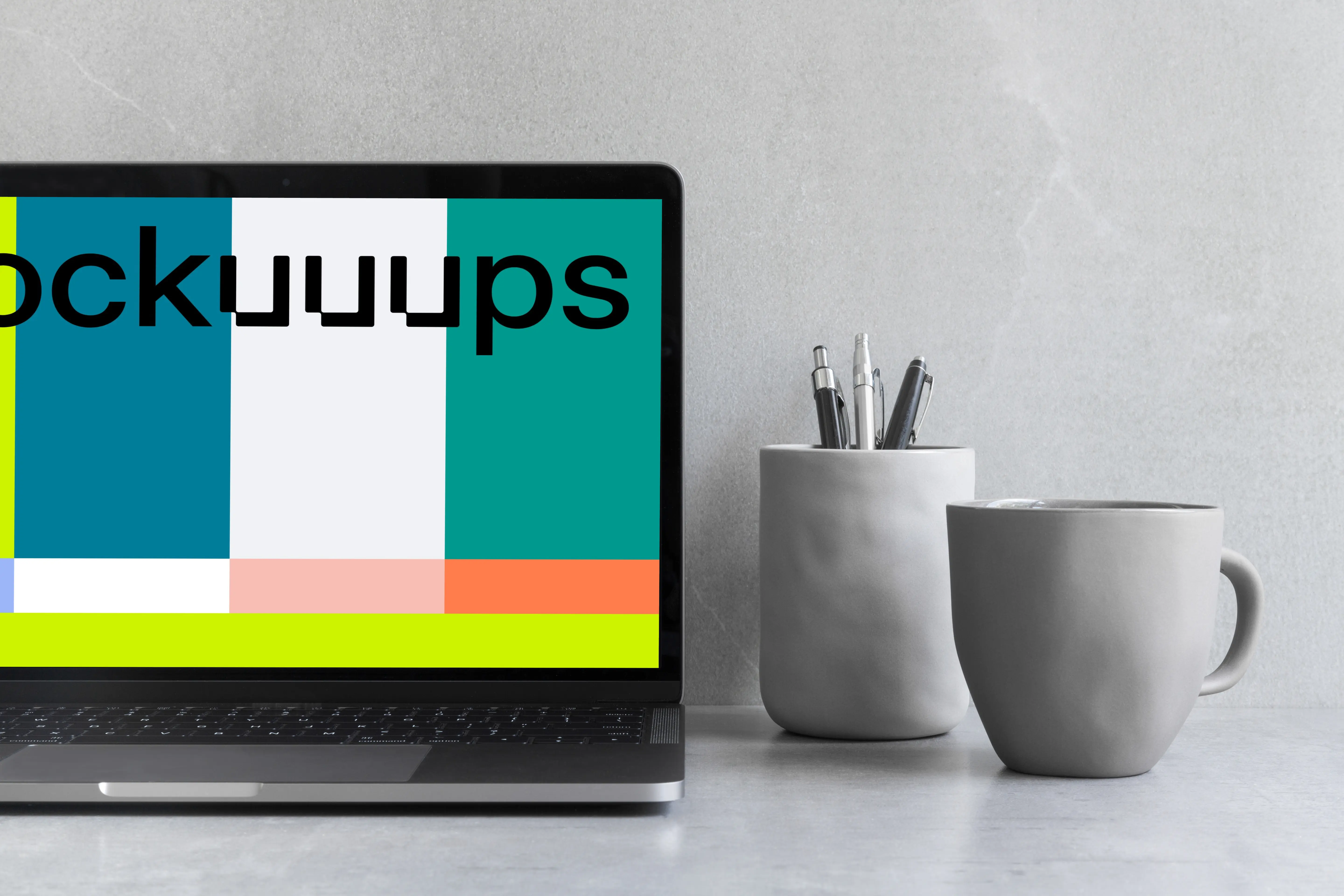 Cropped view of Macbook Pro mockup on the gray table