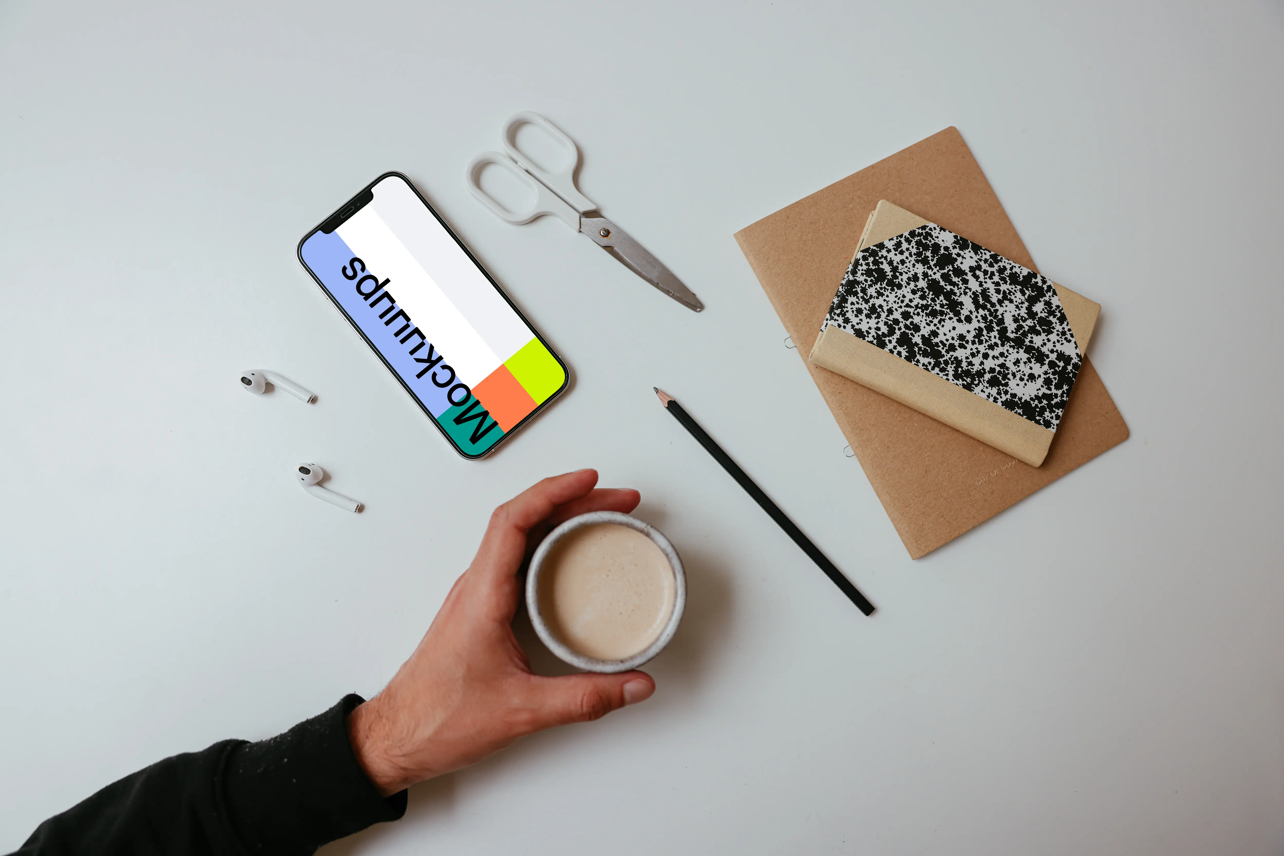 Cup of coffee with iPhone Mockup