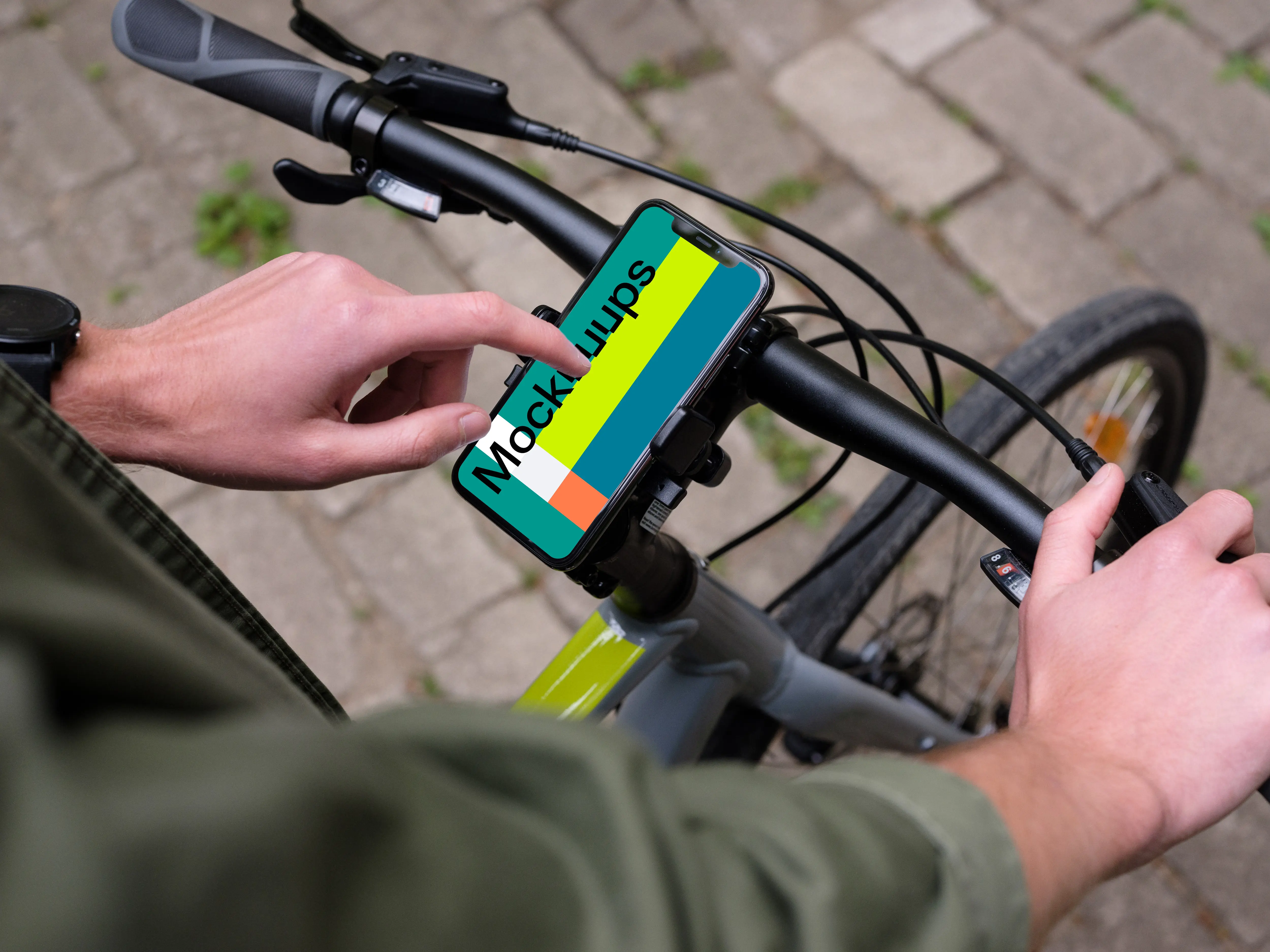Tapping on iPhone 11 Pro mockup mounted on a bike