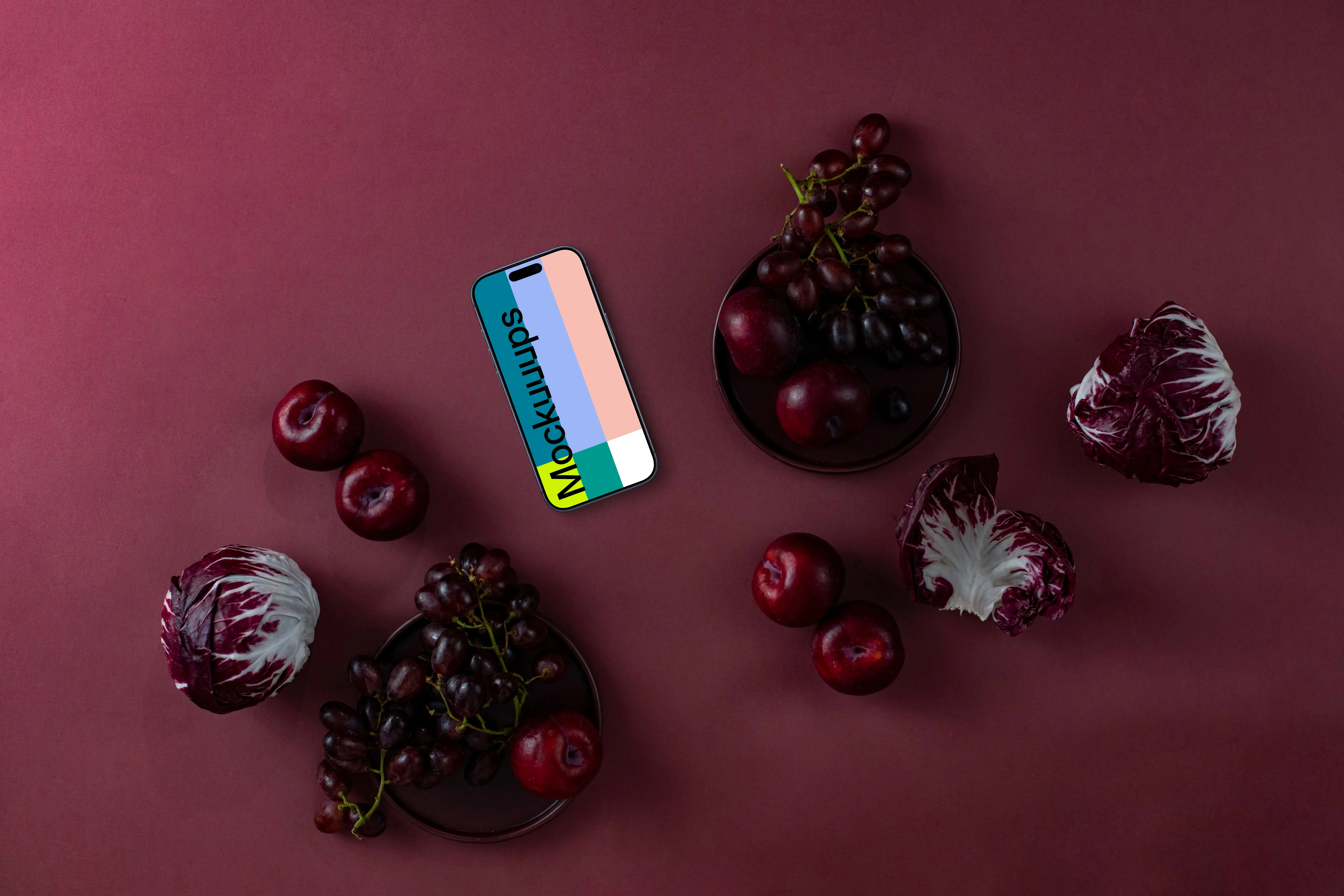 Food in Viva Magenta color shade next to the phone