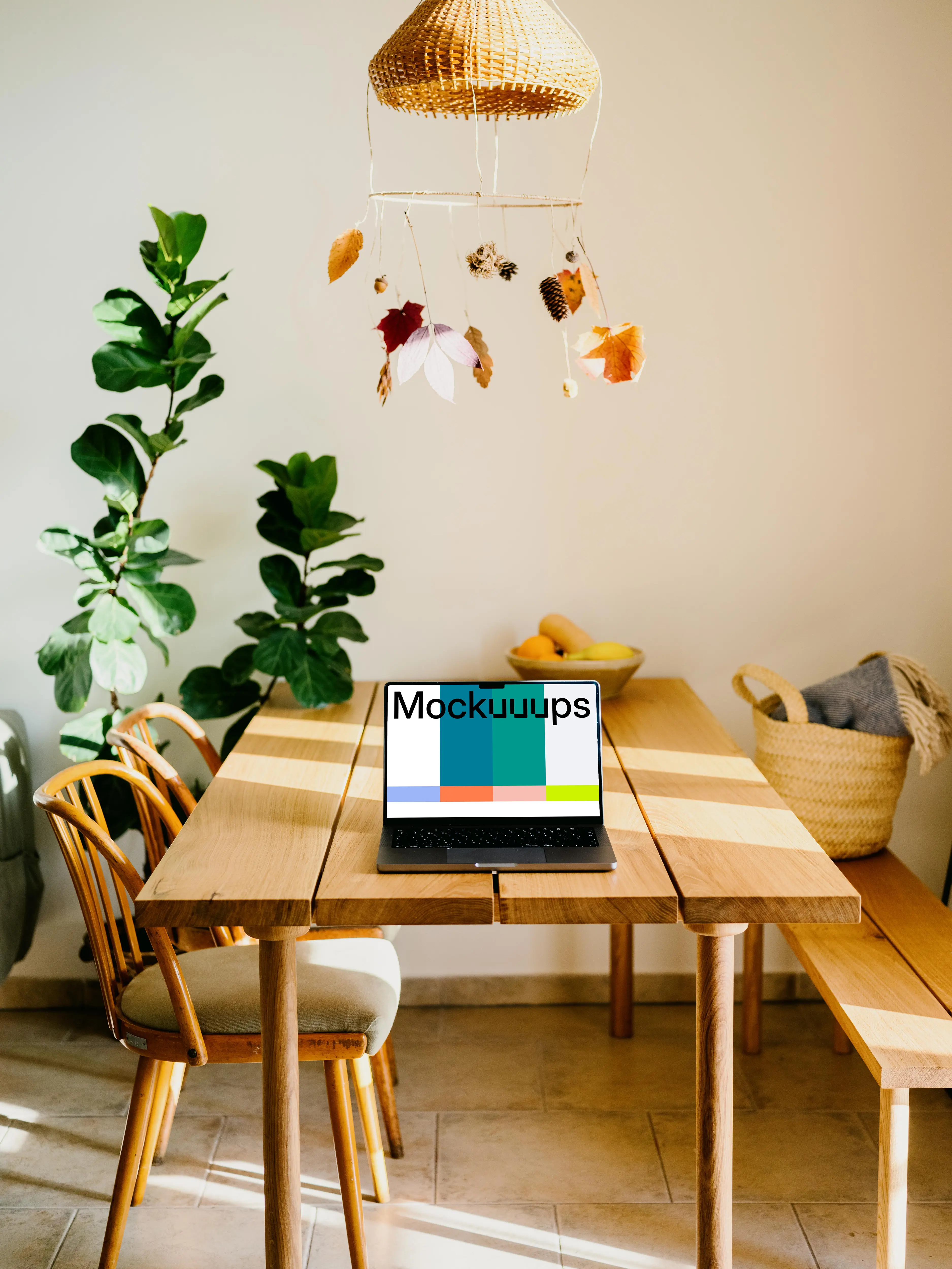 Grey MacBook Pro mockup on a wooden table