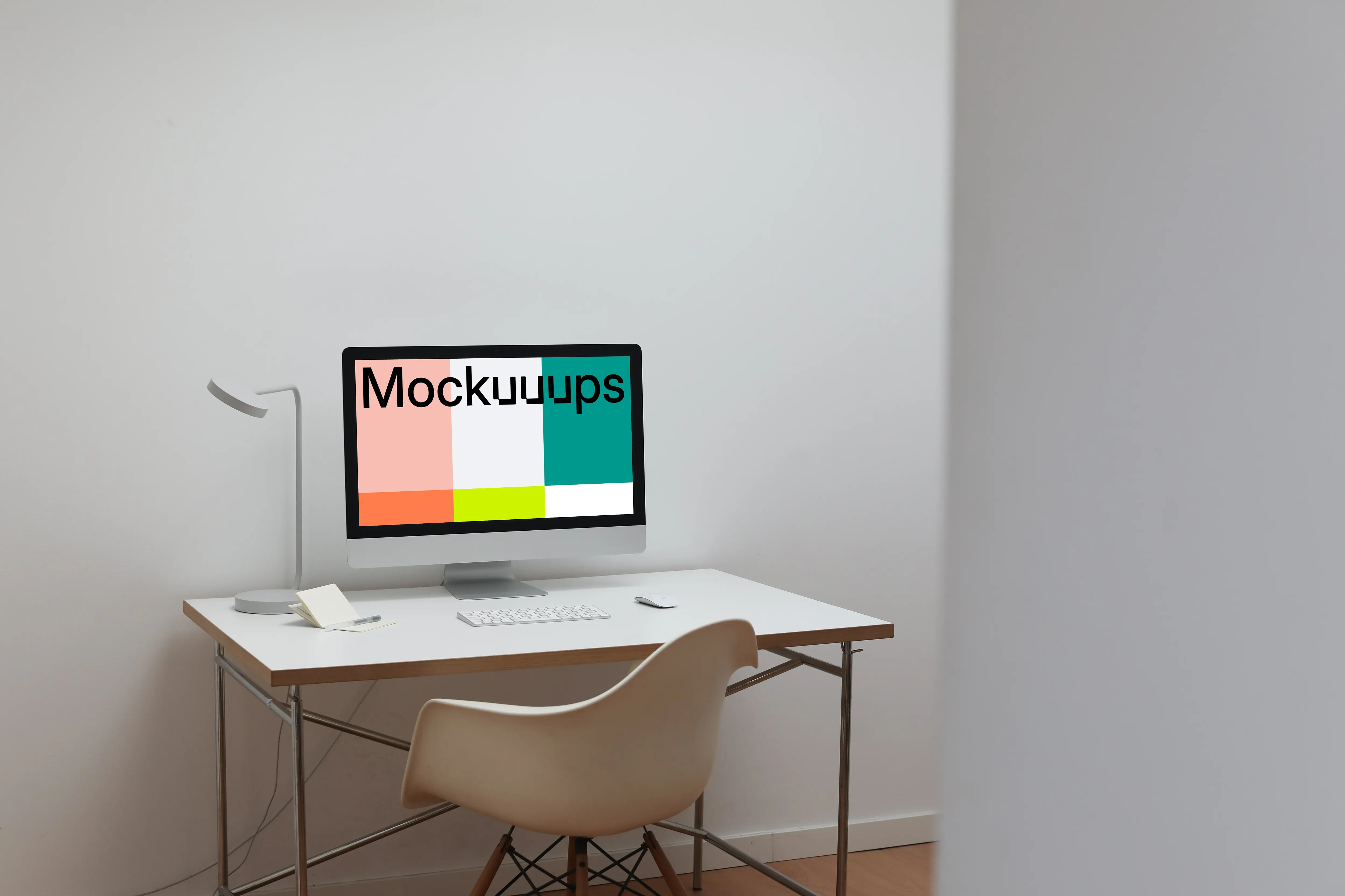 iMac mockup in a simple workspace 
