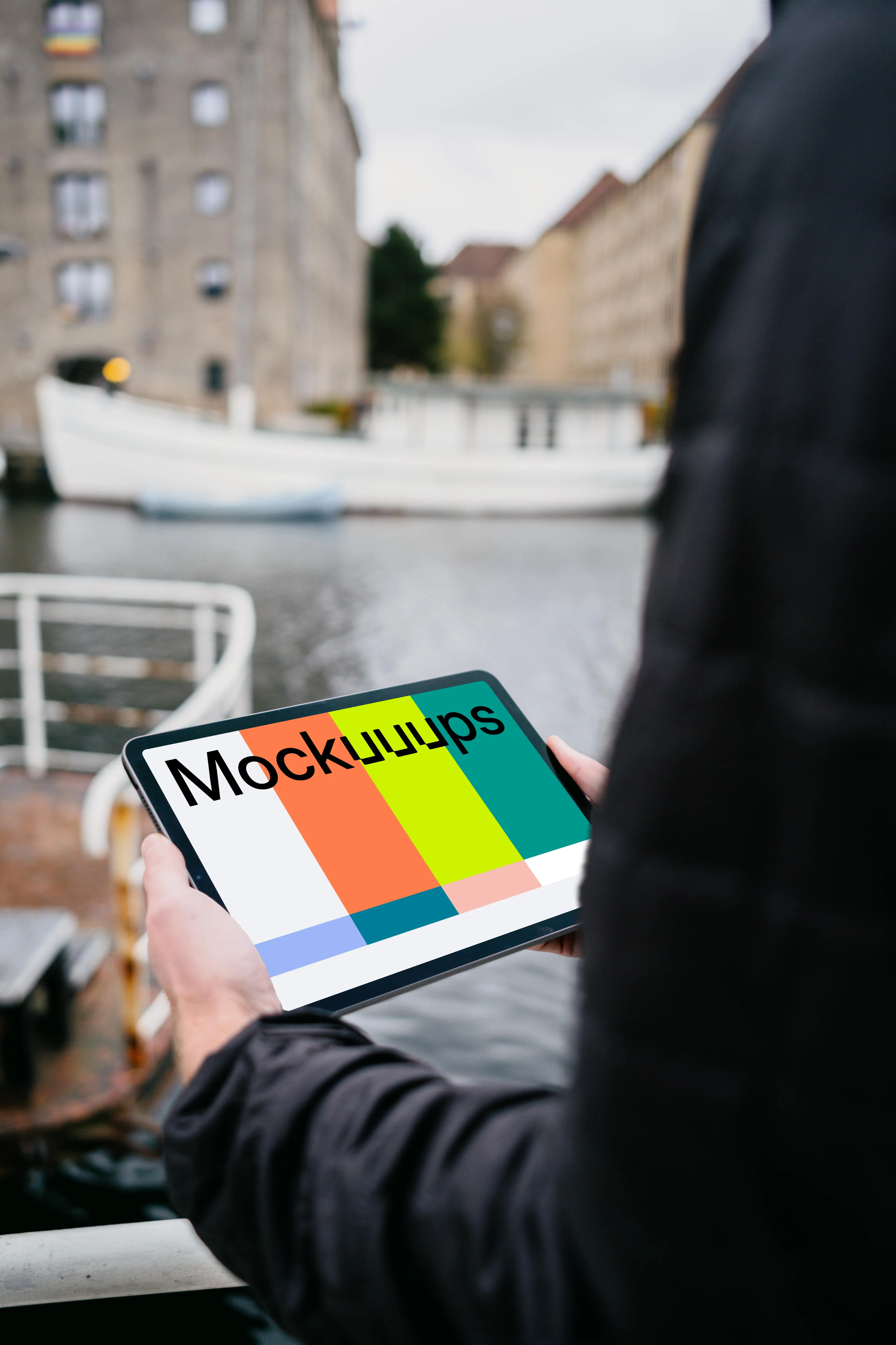 iPad Air mockup held by a user