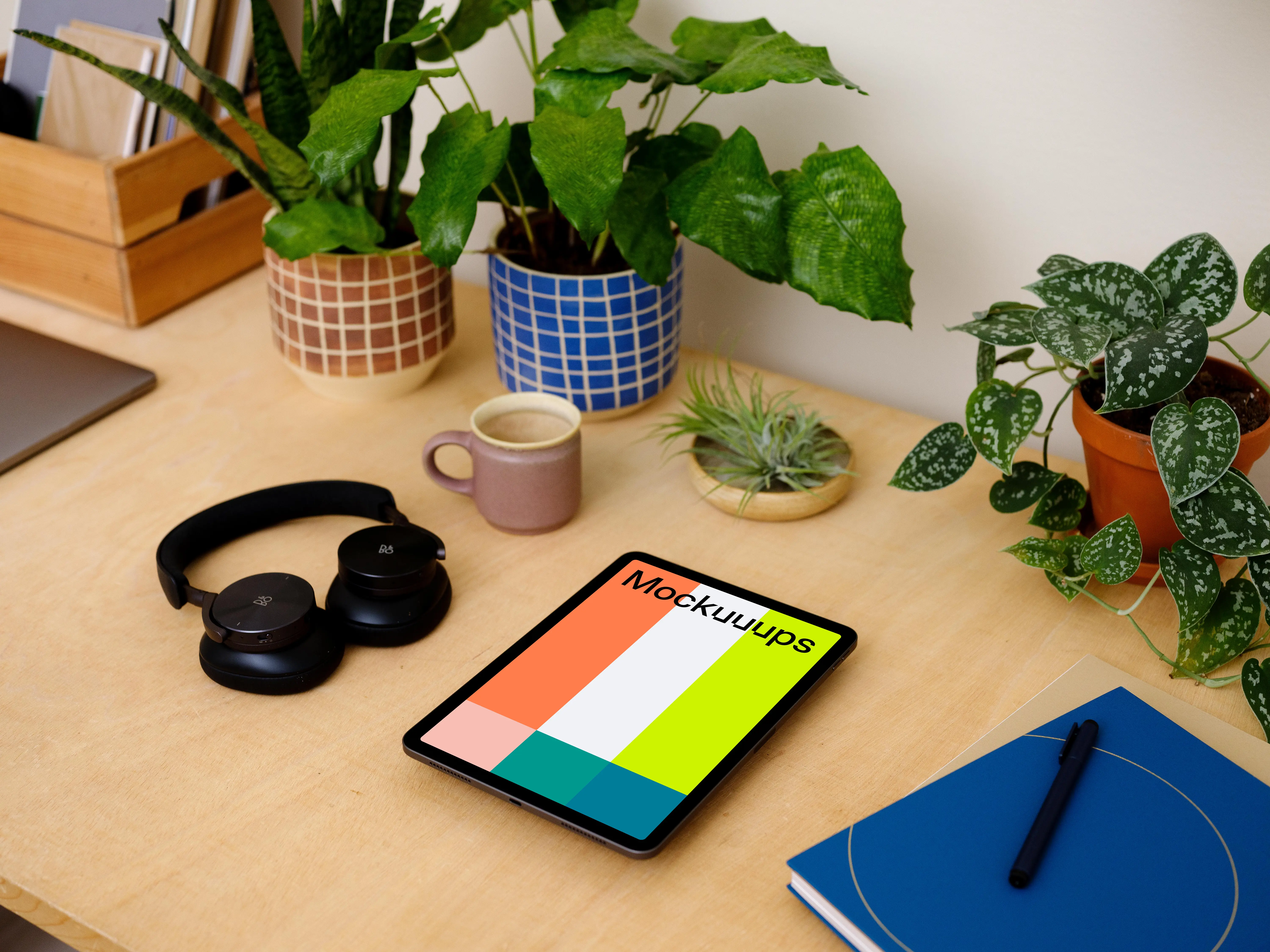 iPad Air mockup with a coffee mug at the side