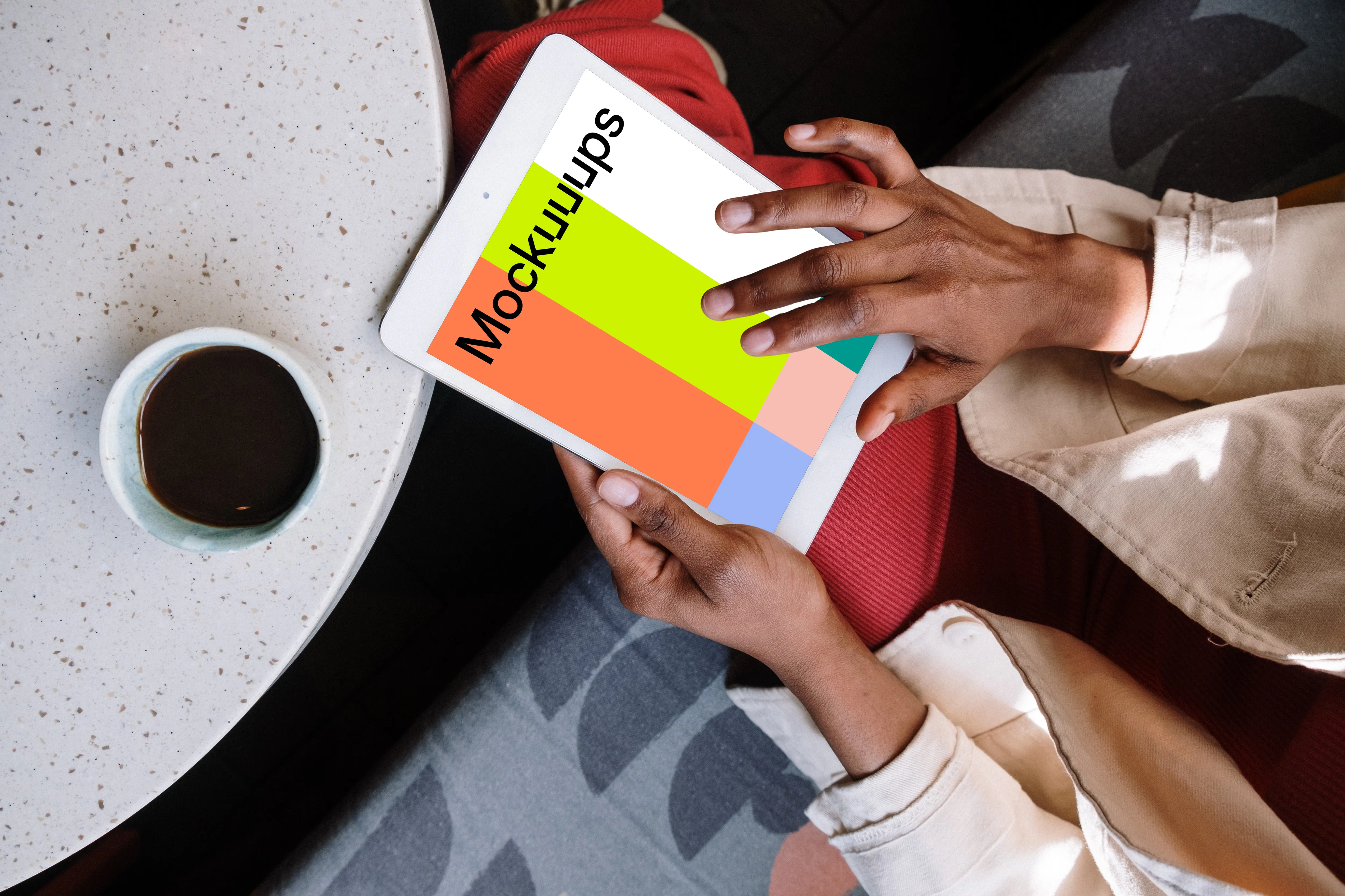 iPad Mini mockup top view in a black ladies hand