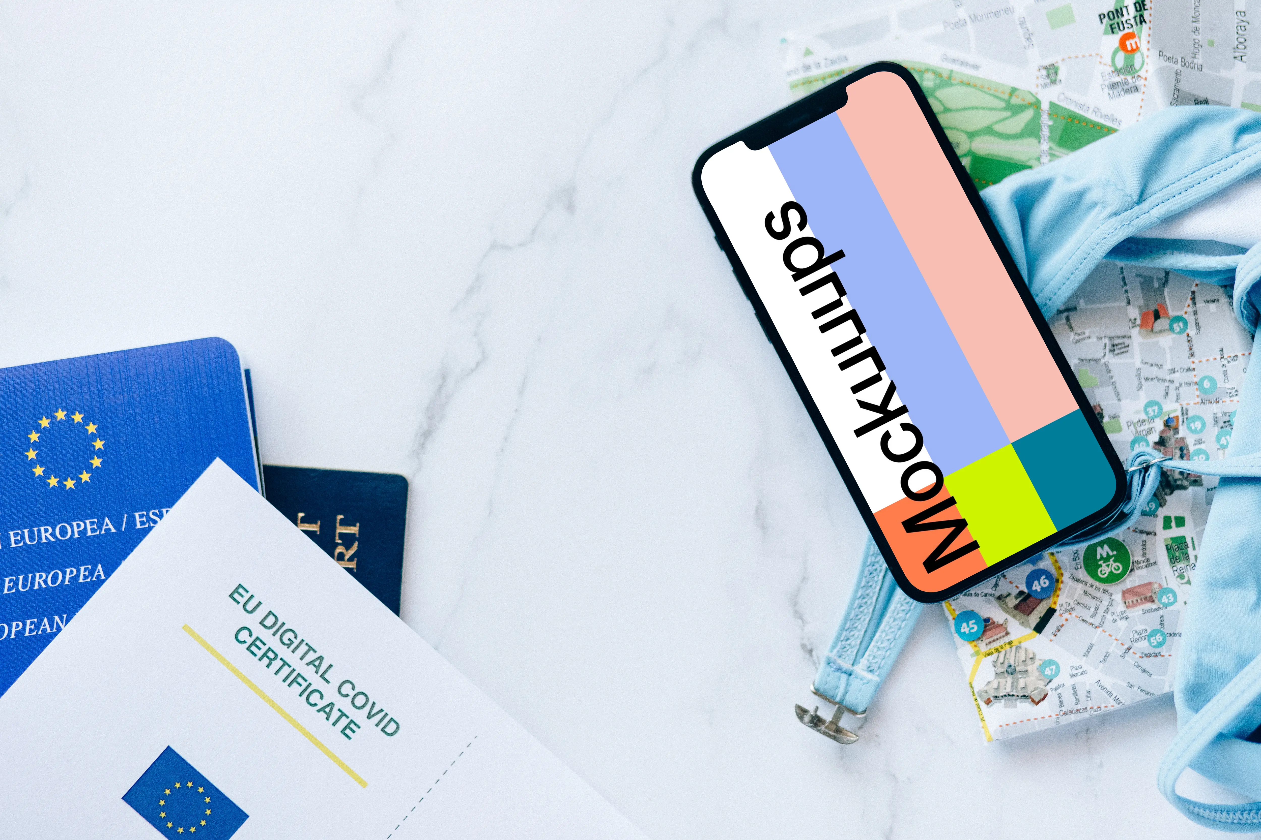 iPhone 12 Pro mockup placed on European travel documents